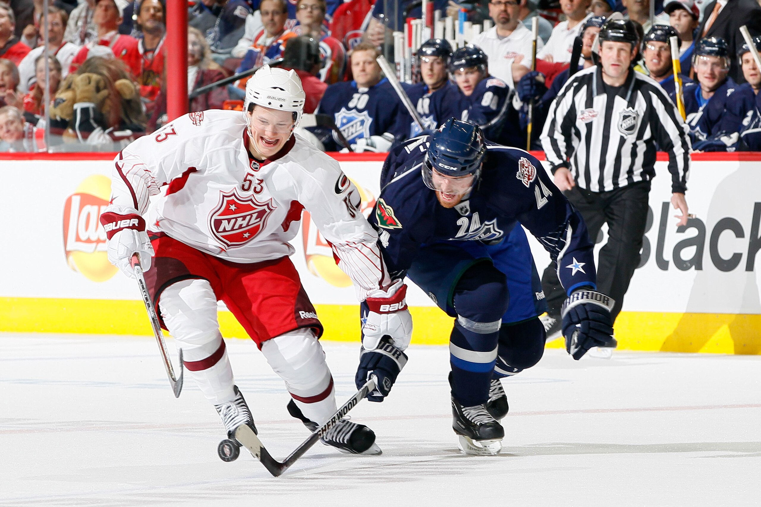 RALEIGH, NC - JANUARY 30:  Martin Havlat #24 of the Minnesota Wild and Team Lidstrom vies for the puck with Jeff Skinner #53 of the Carolina Hurricanes and Team Staal in the 58th NHL All-Star Game at RBC Center on January 30, 2011 in Raleigh, North Caroli