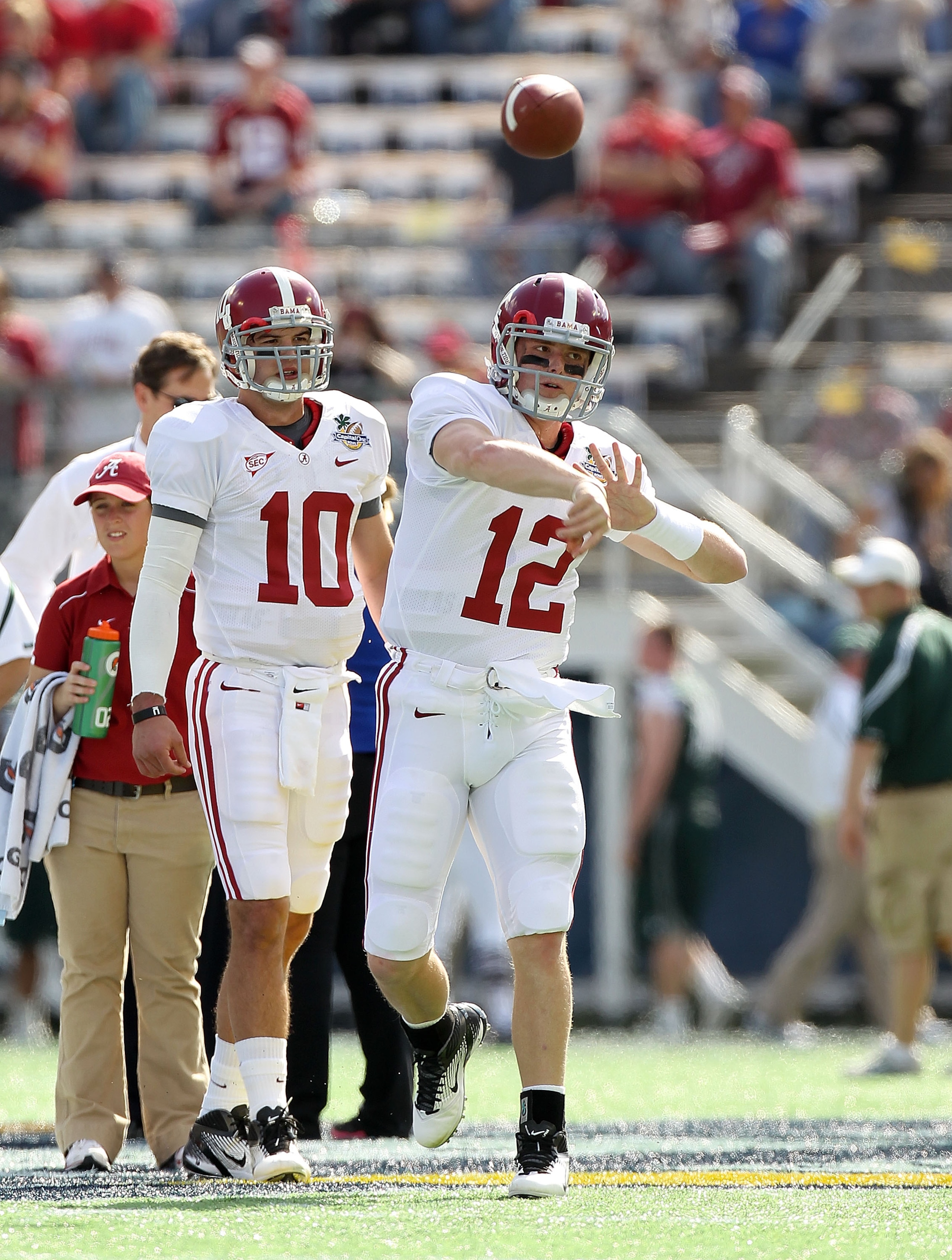 ORLANDO, FL - JANUARY 01:  Greg McElroy #12 of the Alabama Crimson Tide warms up during the Capitol One Bowl against the Michigan State Spartans at the Florida Citrus Bowl on January 1, 2011 in Orlando, Florida.  (Photo by Mike Ehrmann/Getty Images)