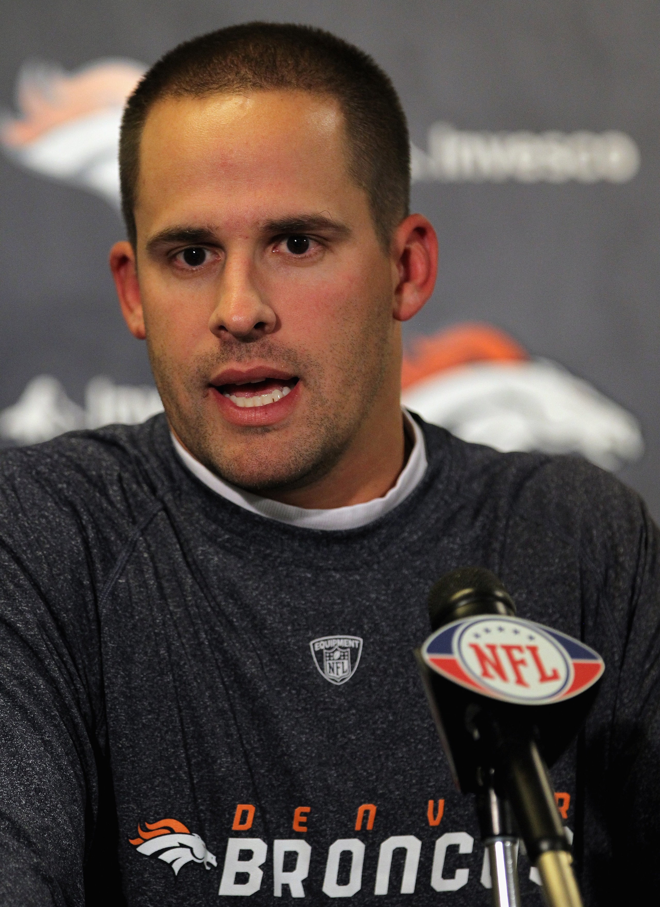 ENGLEWOOD, CO - AUGUST 05: Head coach Josh McDaniels of the Denver Broncos addresses the media prior to practice during training camp at Dove Valley on August 5, 2010 in Englewood, Colorado. (Photo by Doug Pensinger/Getty Images) ENGLEWOOD, CO - AUGUST 05: Head coach Josh McDaniels of the Denver Broncos addresses the media prior to practice during training camp at Dove Valley on August 5, 2010 in Englewood, Colorado. (Photo by Doug Pensinger/Getty Images)