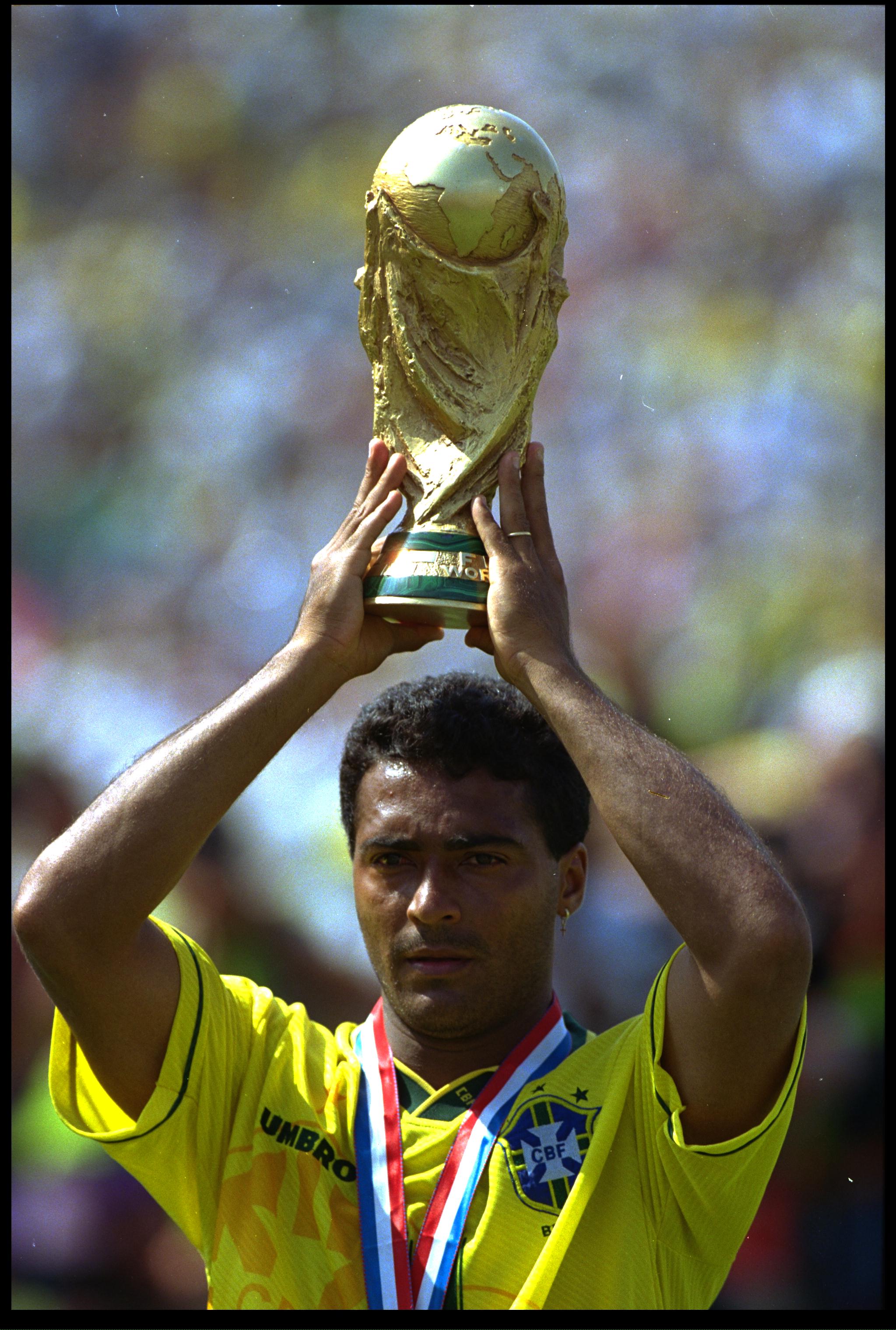 17 JUL 1994:  ROMARIO OF BRAZIL HOLDS THE WORLD CUP OVER HIS HEAD AFTER BRAZIL DEFEATED ITALY 3-2 IN A PENALTY SHOOT OUT IN THE WORLD CUP FINAL.