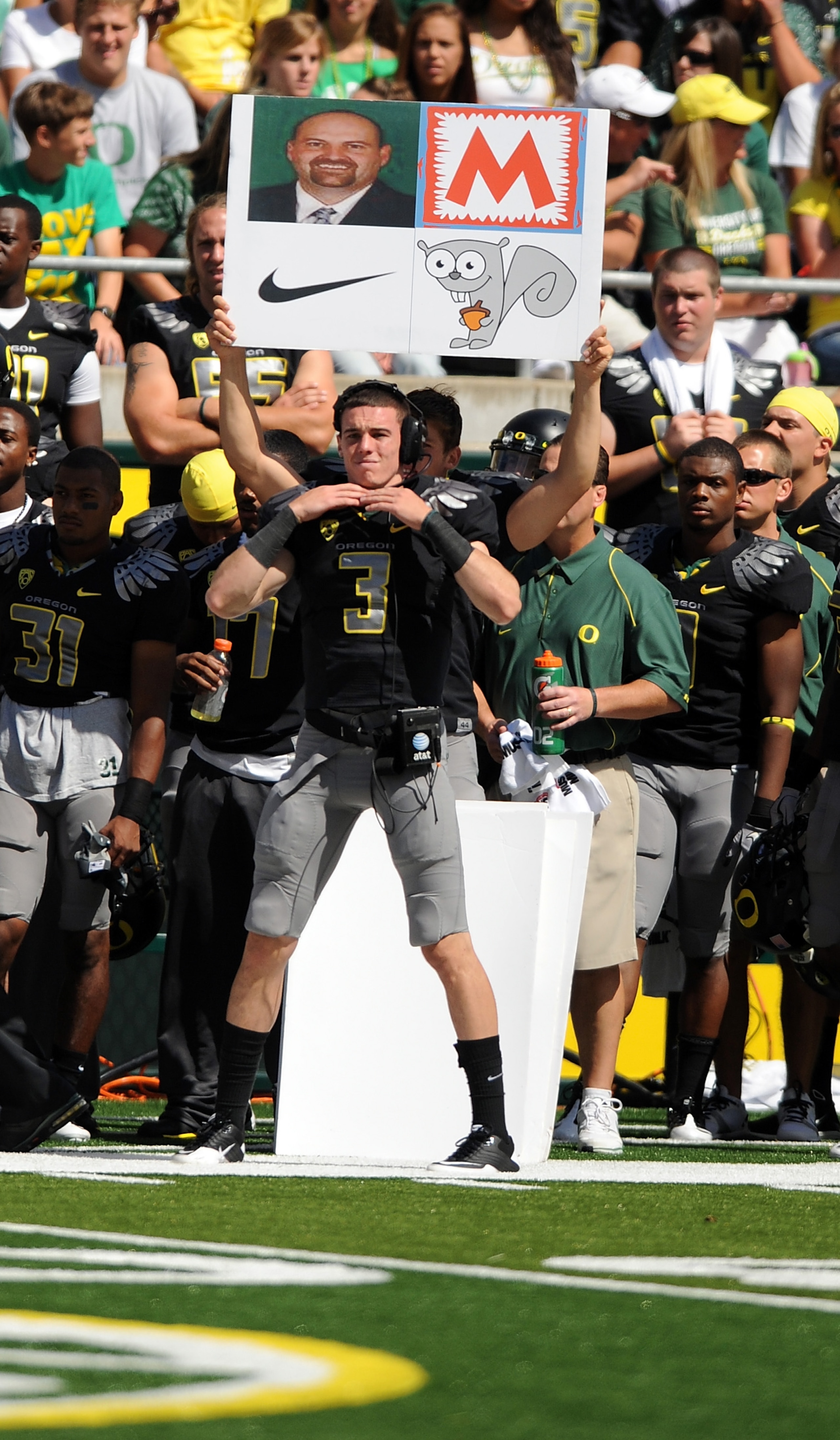 EUGENE, OR - SEPTEMBER 04: Quarterback Bryan Bennett #3 of the Oregon Ducks signals in a play in front of the signal boards that the Ducks use to call plays during the game against the New Mexico Lobos at Autzen Stadium on September 4, 2010 in Eugene, Or EUGENE, OR - SEPTEMBER 04: Quarterback Bryan Bennett #3 of the Oregon Ducks signals in a play in front of the signal boards that the Ducks use to call plays during the game against the New Mexico Lobos at Autzen Stadium on September 4, 2010 in Eugene, Or