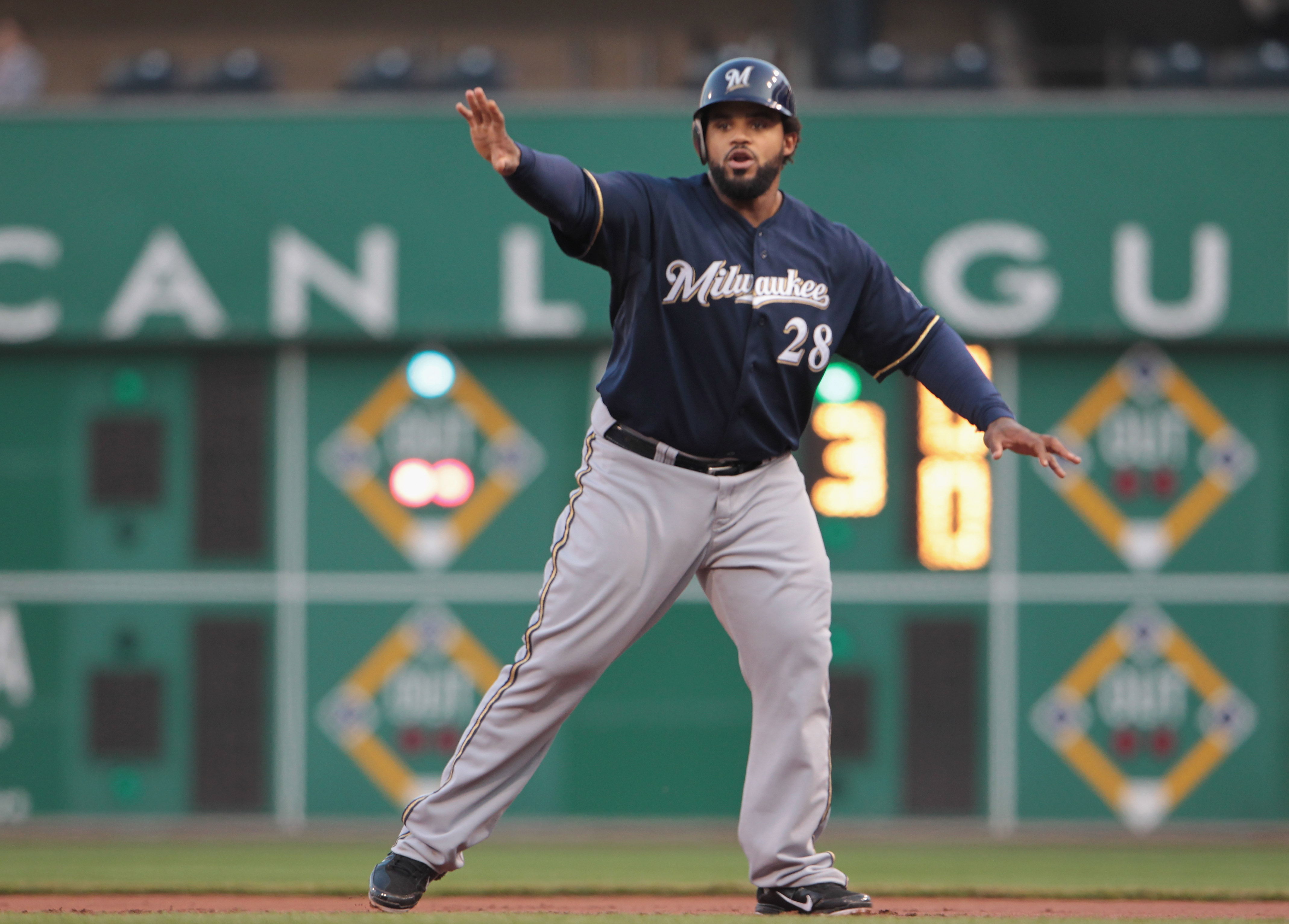 Milwaukee Brewers first baseman Prince Fielder (28) hits a double down the  first base line during the game between the Colorado Rockies and Milwaukee  Brewers at Miller Park in Milwaukee. The Brewers