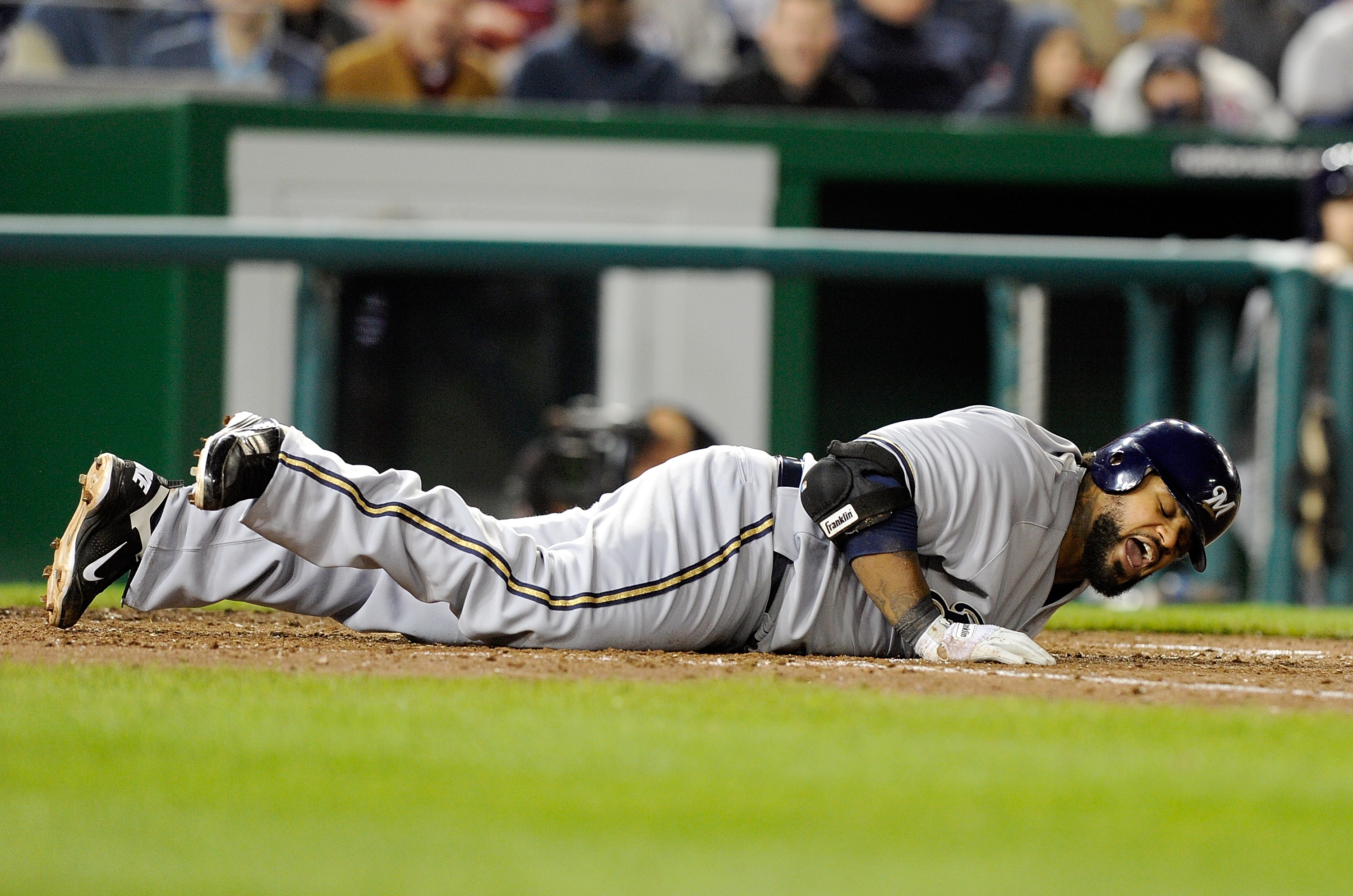 Milwaukee Brewers first baseman Prince Fielder (28) hits a double down the  first base line during the game between the Colorado Rockies and Milwaukee  Brewers at Miller Park in Milwaukee. The Brewers