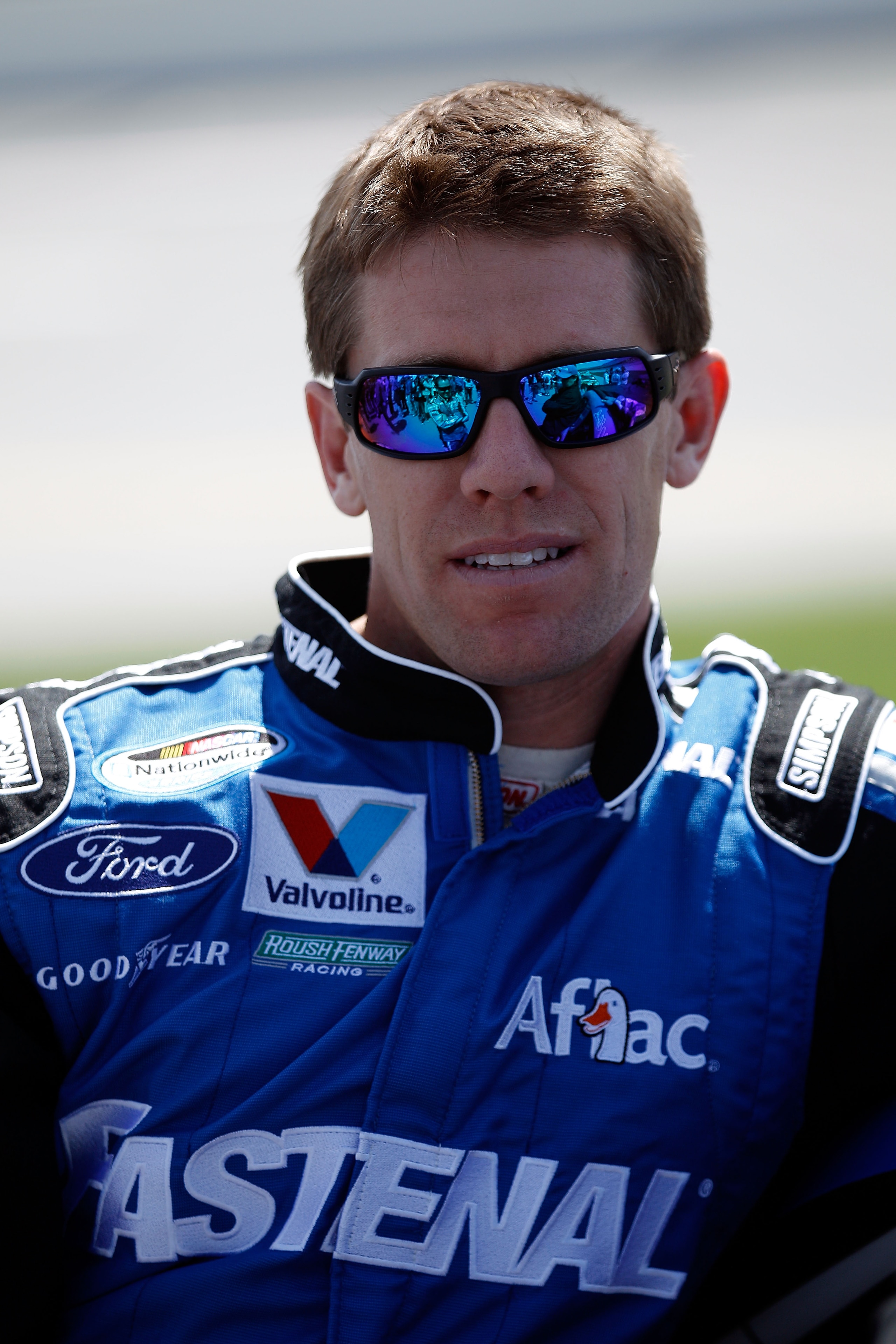 TALLADEGA, AL - APRIL 16: Carl Edwards, driver of the #60 Fastenal Ford, stands on the grid prior to the start of the NASCAR Nationwide Series Aaron's 312 at Talladega Superspeedway on April 16, 2011 in Talladega, Alabama. (Photo by Chris Graythen/Getty TALLADEGA, AL - APRIL 16: Carl Edwards, driver of the #60 Fastenal Ford, stands on the grid prior to the start of the NASCAR Nationwide Series Aaron's 312 at Talladega Superspeedway on April 16, 2011 in Talladega, Alabama. (Photo by Chris Graythen/Getty