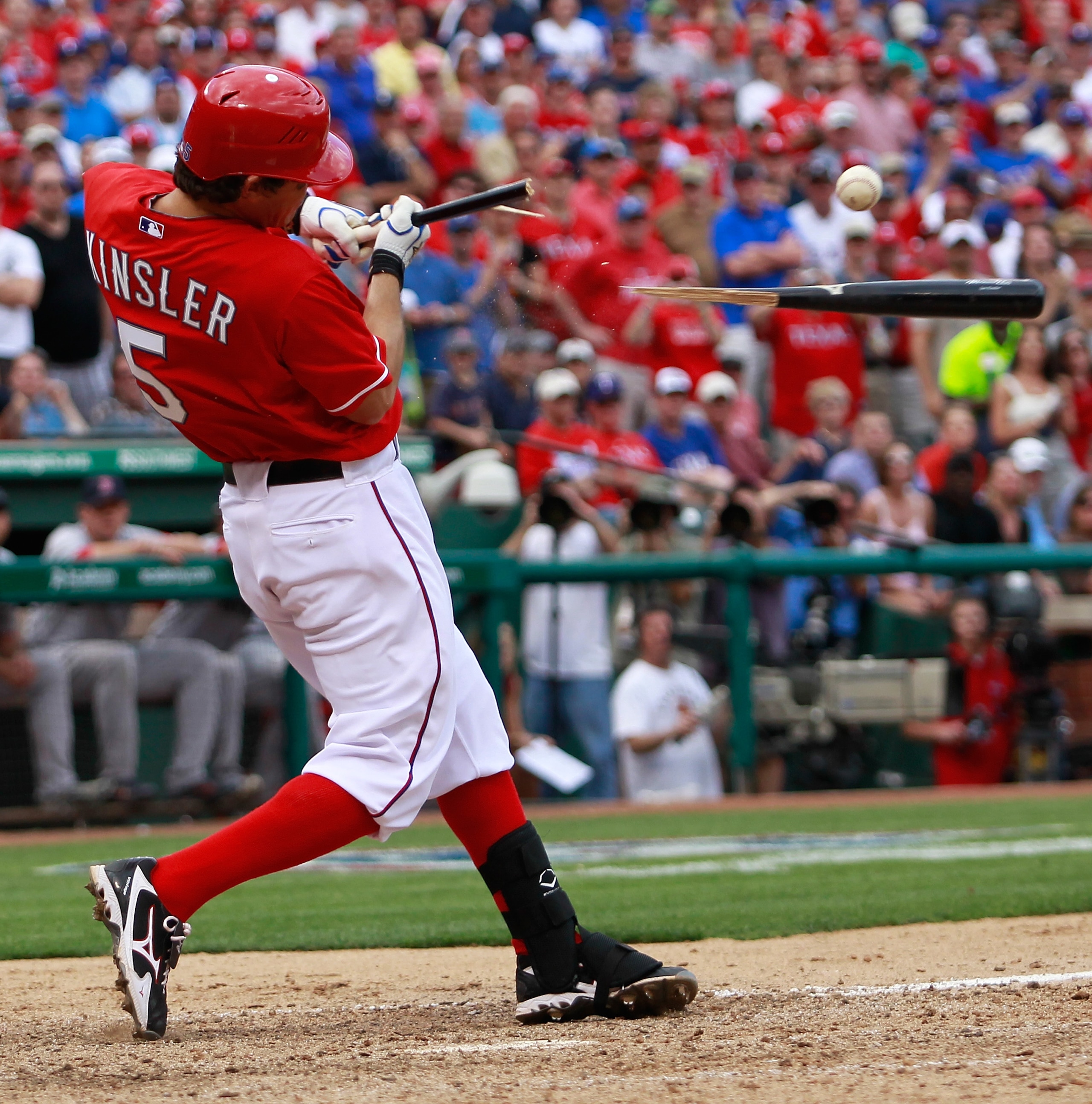 ARLINGTON, TX - APRIL 01: Ian Kinsler #5 of the Texas Rangers shatters his bat on a pitch against the Boston Red Sox on Opening Day at Rangers Ballpark in Arlington on April 1, 2011 in Arlington, Texas. (Photo by Tom Pennington/Getty Images) ARLINGTON, TX - APRIL 01: Ian Kinsler #5 of the Texas Rangers shatters his bat on a pitch against the Boston Red Sox on Opening Day at Rangers Ballpark in Arlington on April 1, 2011 in Arlington, Texas. (Photo by Tom Pennington/Getty Images)
