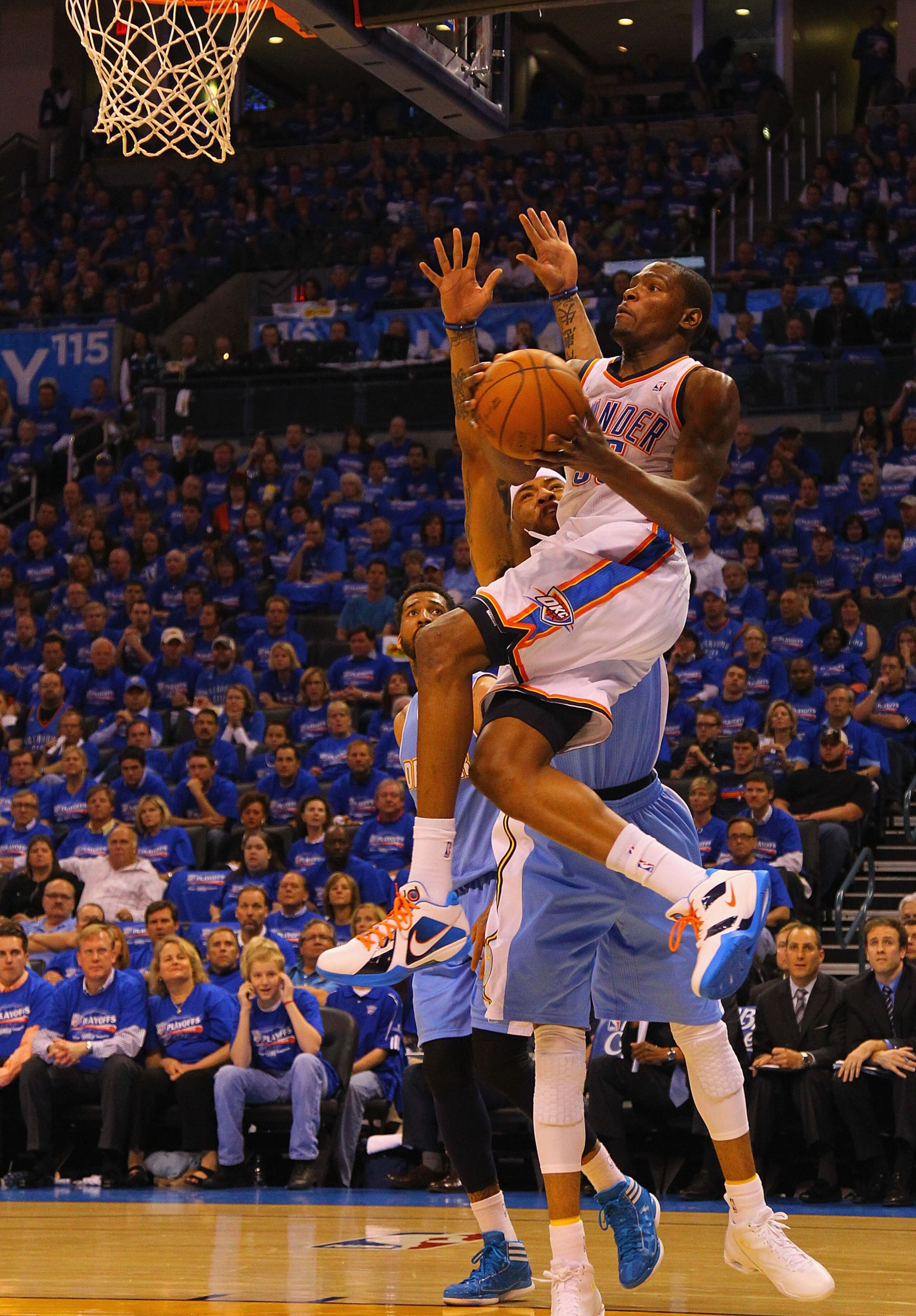 OKLAHOMA CITY, OK - APRIL 17: Kevin Durant #35 of the Oklahoma City Thunder looks to score against Kenyon Martin #4 of the Denver Nuggets in Game One of the Western Conference Quarterfinals in the 2011 NBA Playoffs on April 17, 2011 at the Ford Center in