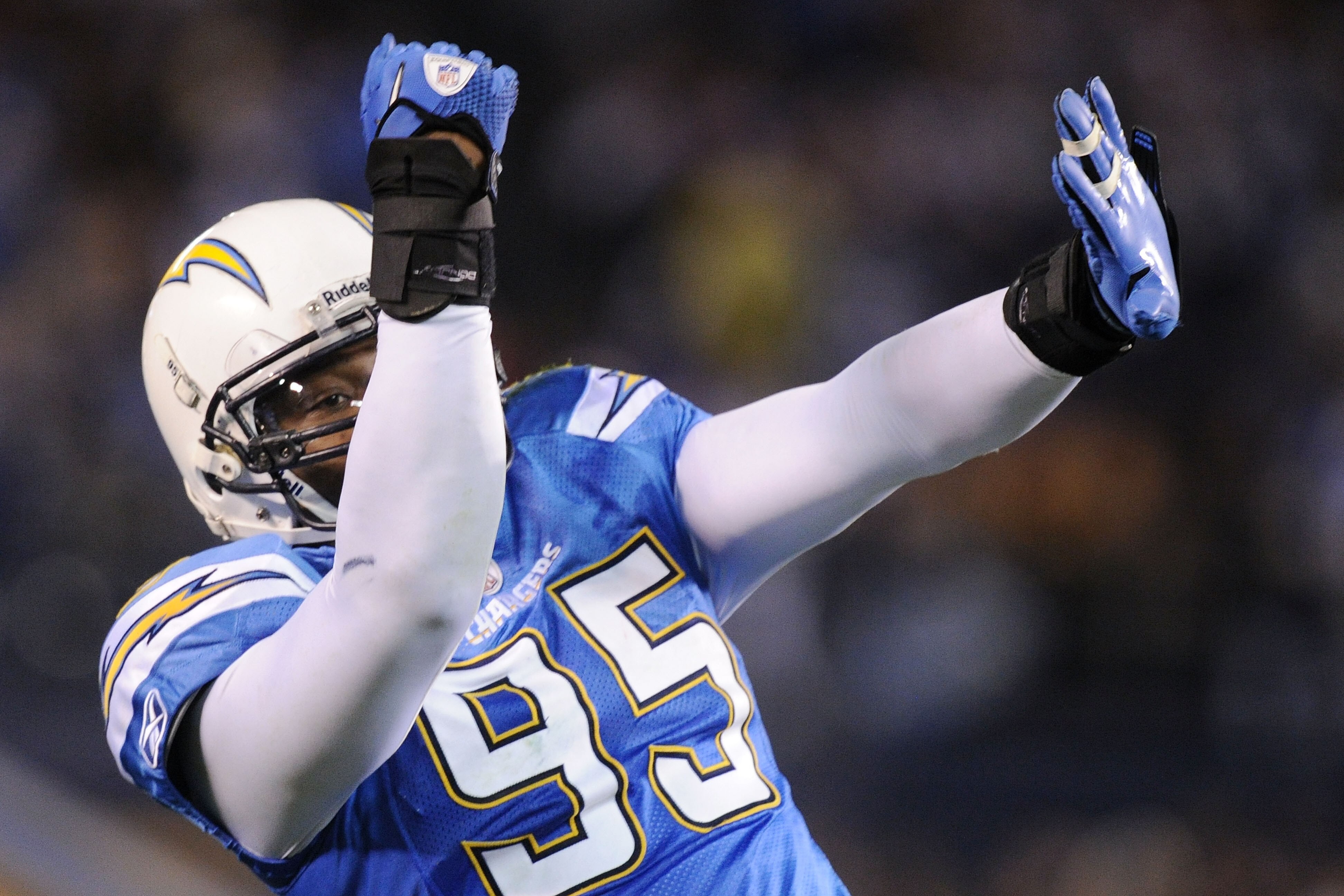SAN DIEGO, CA - DECEMBER 16: Linebacker Shaun Phillips #95 of the San Diego Chargers celebrates a sack in the third quarter against the San Francisco 49ers at Qualcomm Stadium on December 16, 2010 in San Diego, California. (Photo by Harry How/Getty Imag SAN DIEGO, CA - DECEMBER 16: Linebacker Shaun Phillips #95 of the San Diego Chargers celebrates a sack in the third quarter against the San Francisco 49ers at Qualcomm Stadium on December 16, 2010 in San Diego, California. (Photo by Harry How/Getty Imag