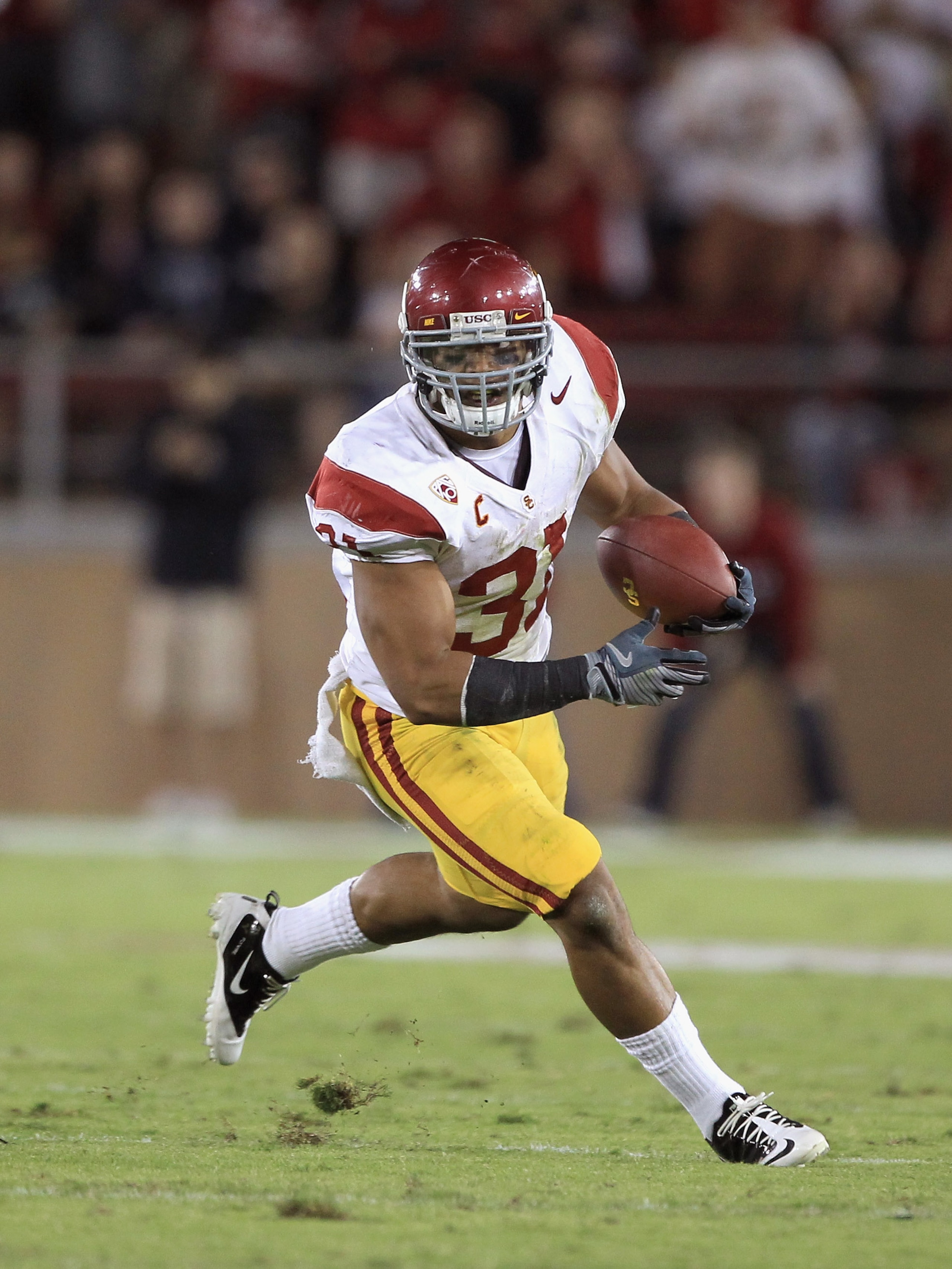PALO ALTO, CA - OCTOBER 09:  Stanley Havili #31 of the USC Trojans runs with the ball during their game against the Stanford Cardinal at Stanford Stadium on October 9, 2010 in Palo Alto, California.  (Photo by Ezra Shaw/Getty Images)