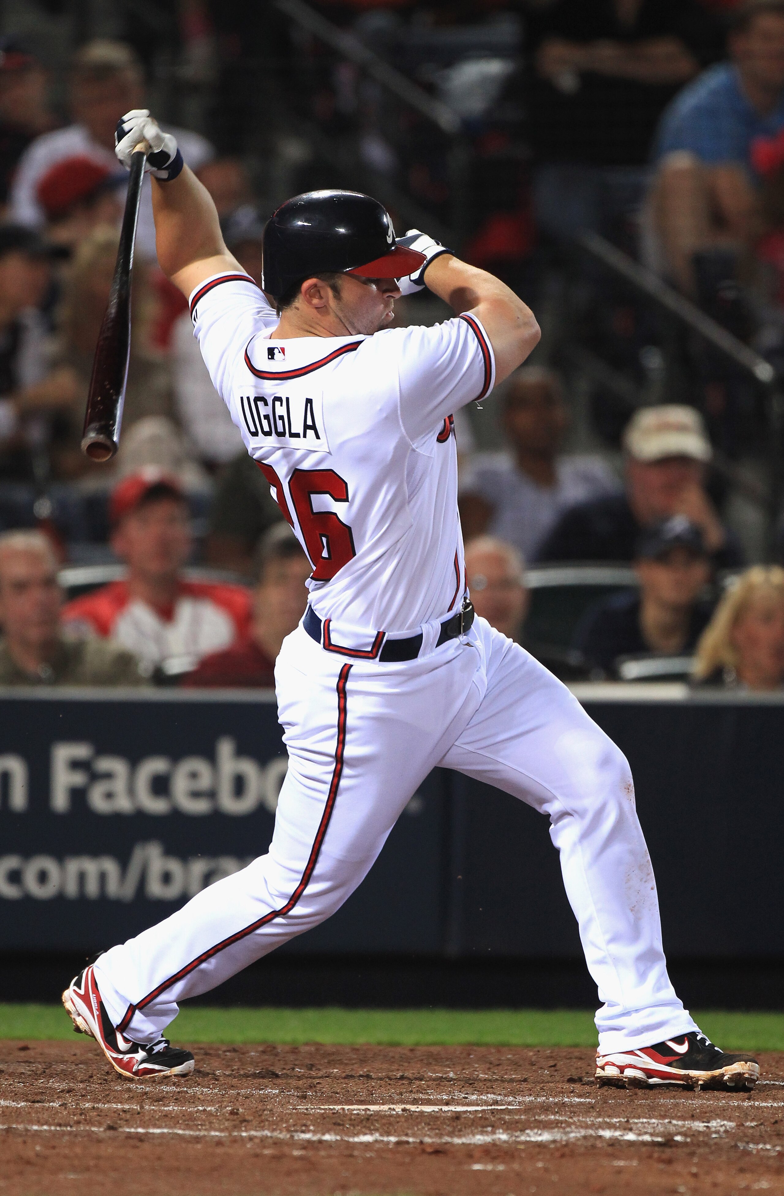 ATLANTA, GA - APRIL 08: Dan Uggla #26 of the Atlanta Braves during their opening day game against the Philadelphia Phillies at Turner Field on April 8, 2011 in Atlanta, Georgia. (Photo by Streeter Lecka/Getty Images) ATLANTA, GA - APRIL 08: Dan Uggla #26 of the Atlanta Braves during their opening day game against the Philadelphia Phillies at Turner Field on April 8, 2011 in Atlanta, Georgia. (Photo by Streeter Lecka/Getty Images)