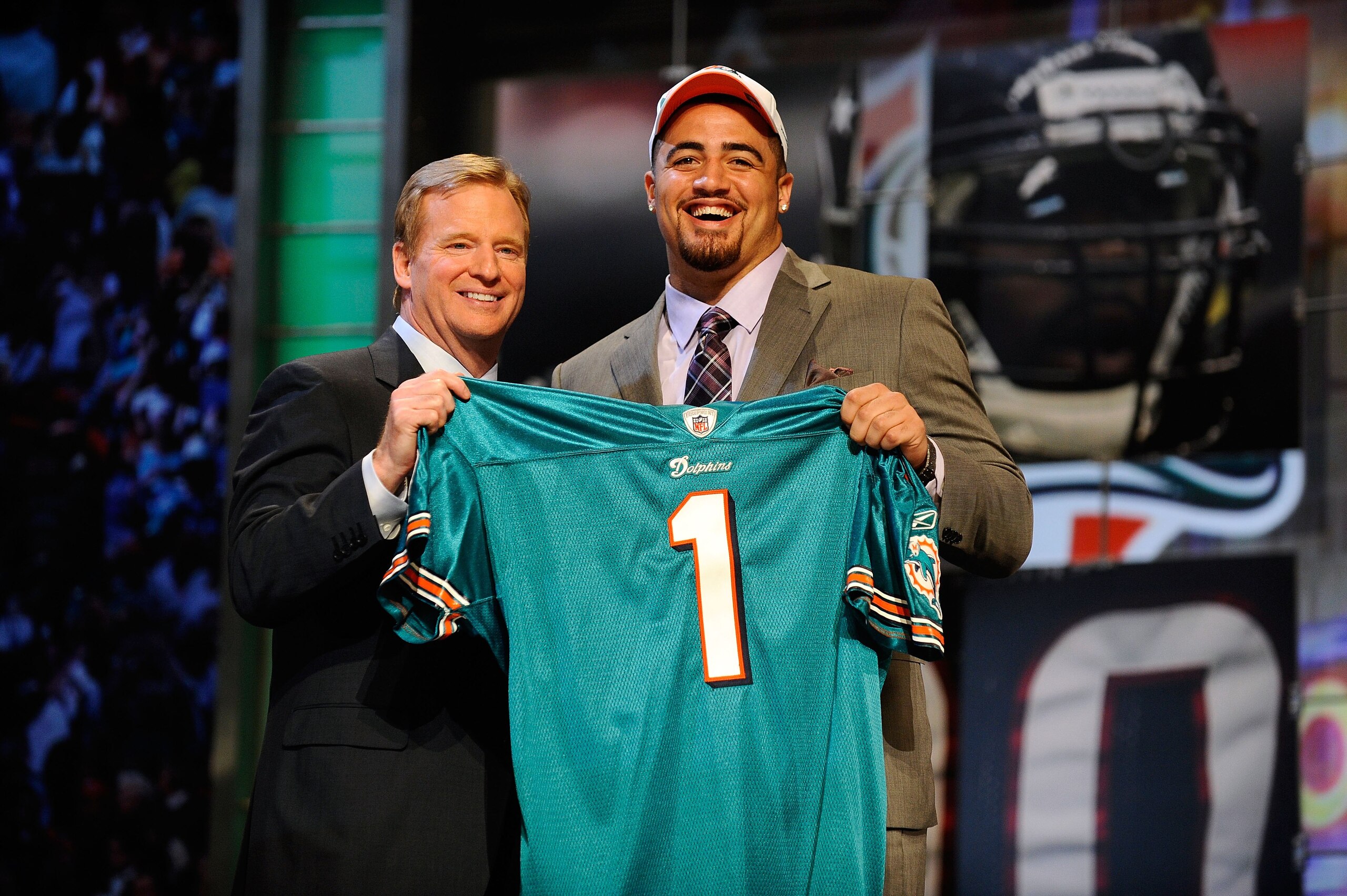 NEW YORK - APRIL 22:  Jared Odrick (R) from Penn State poses with NFL Commissioner Roger Goodell as they hold up a Miami Dolphins jersey after the Dolphins selected Odrick number 28 overall during the first round of the 2010 NFL Draft at Radio City Music