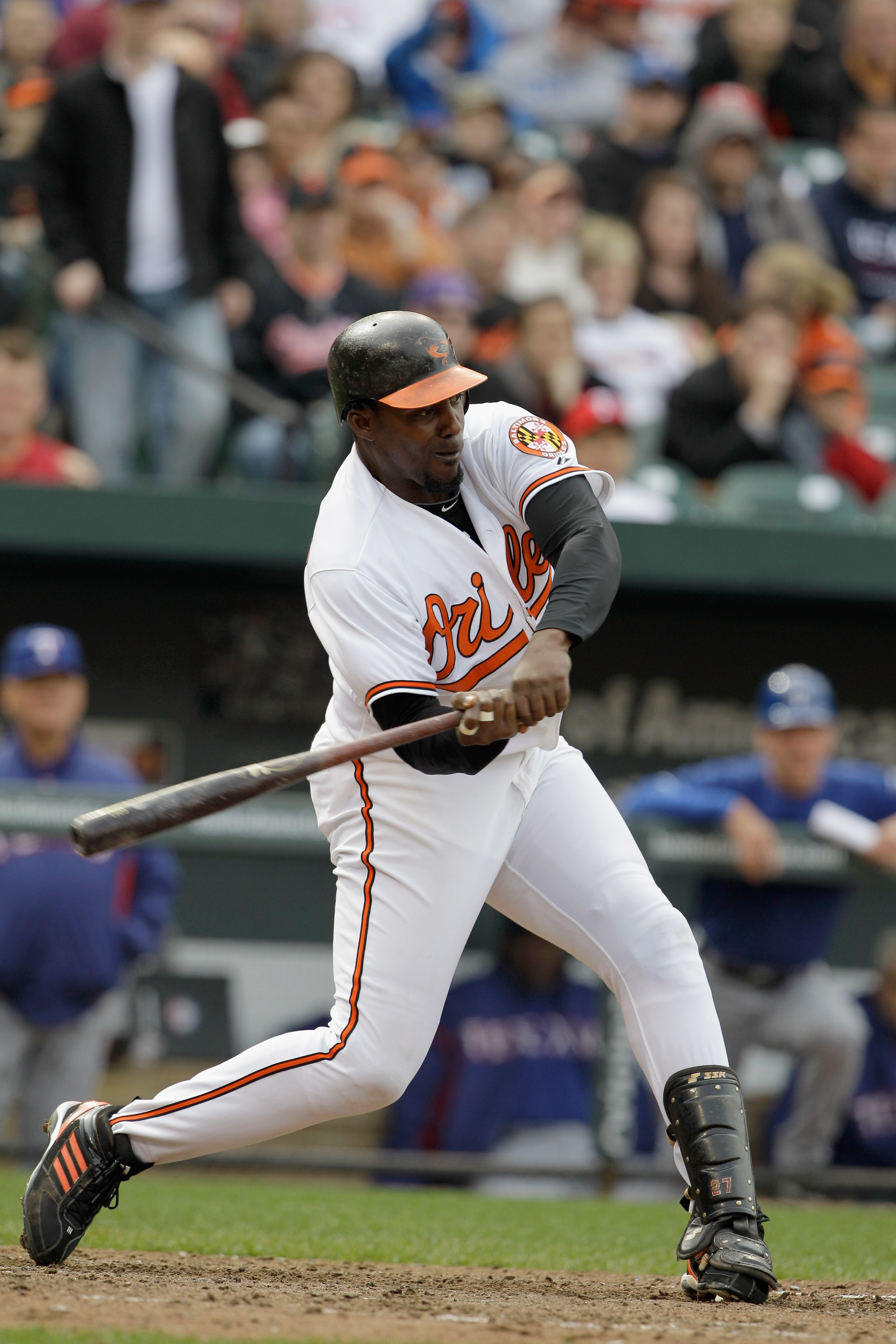 BALTIMORE, MD - APRIL 10:  Vladimir Guerrero #27 of the Baltimore Orioles at the plate against the Texas Rangers at Oriole Park at Camden Yards on April 10, 2011 in Baltimore, Maryland.  (Photo by Rob Carr/Getty Images)