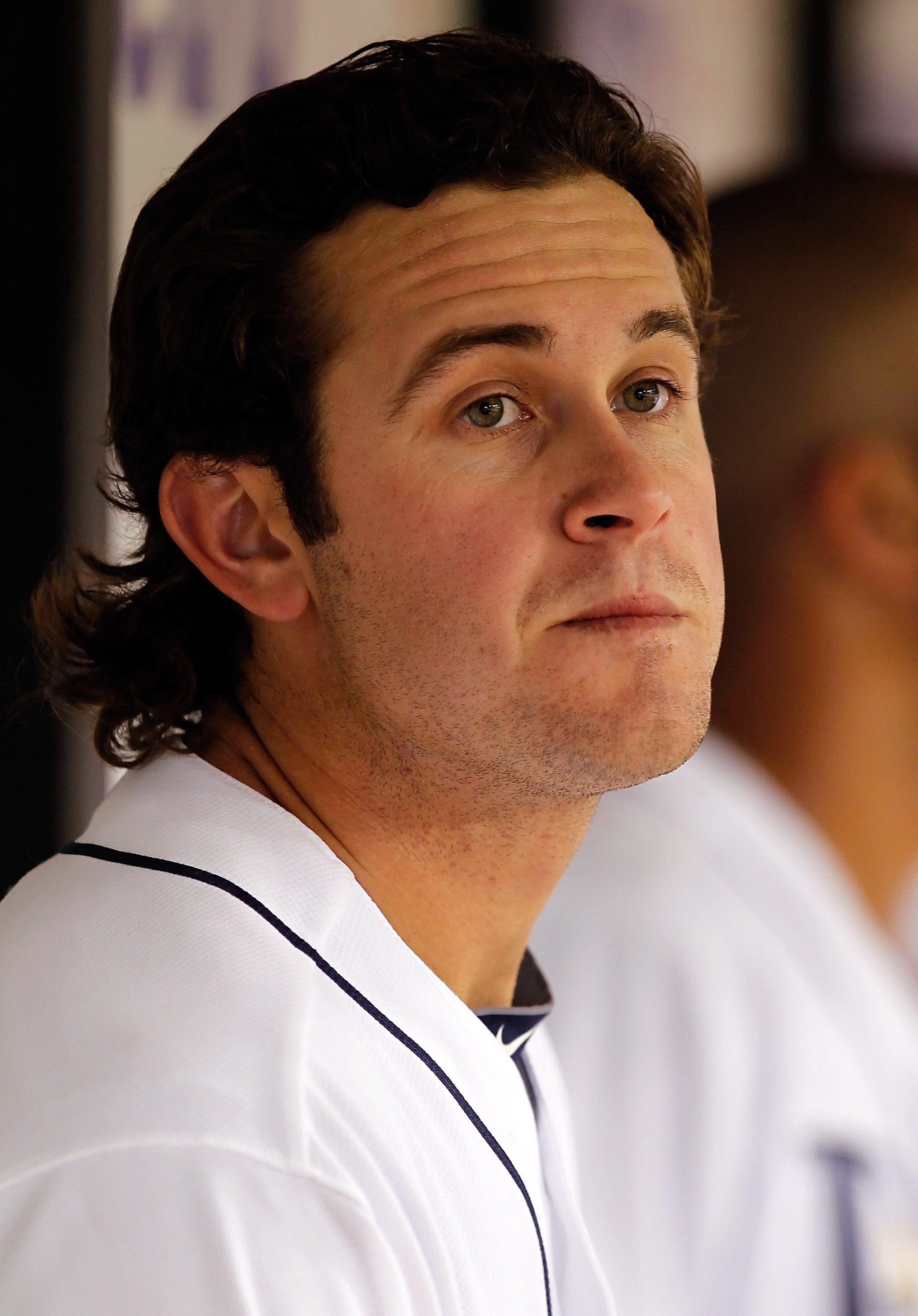 ST. PETERSBURG, FL - APRIL 01:  Infielder Evan Longoria #3 of the Tampa Bay Rays watches his team from the bench against the Baltimore Orioles during the Opening Day game at Tropicana Field on April 1, 2011 in St. Petersburg, Florida.  (Photo by J. Meric/