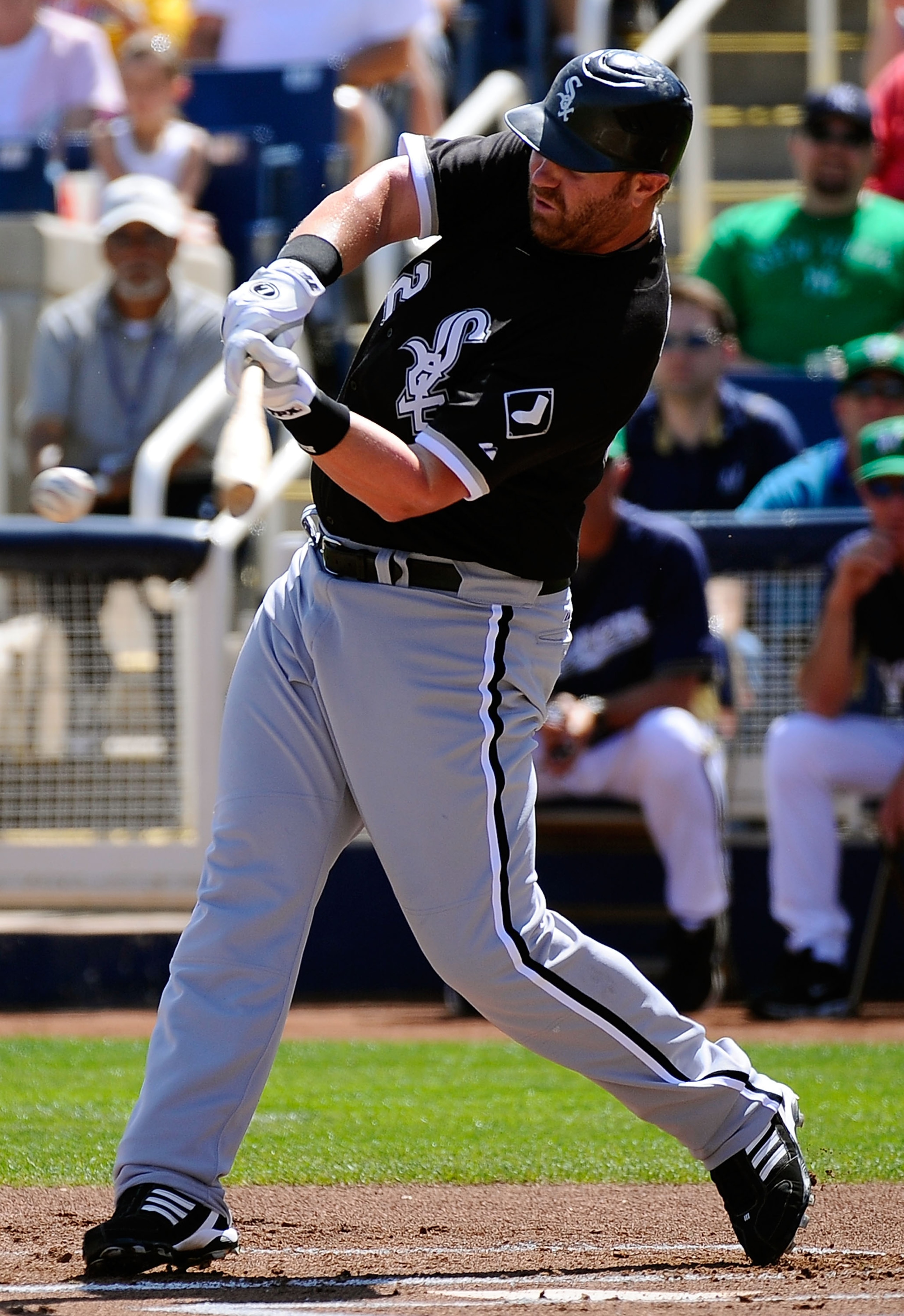 PHOENIX, AZ - MARCH 17:  Adam Dunn #32 of the Chicago White Sox at bat against the Milwaukee Brewers during the spring training game at Maryvale Baseball Park on March 17, 2011 in Phoenix, Arizona.  (Photo by Kevork Djansezian/Getty Images)