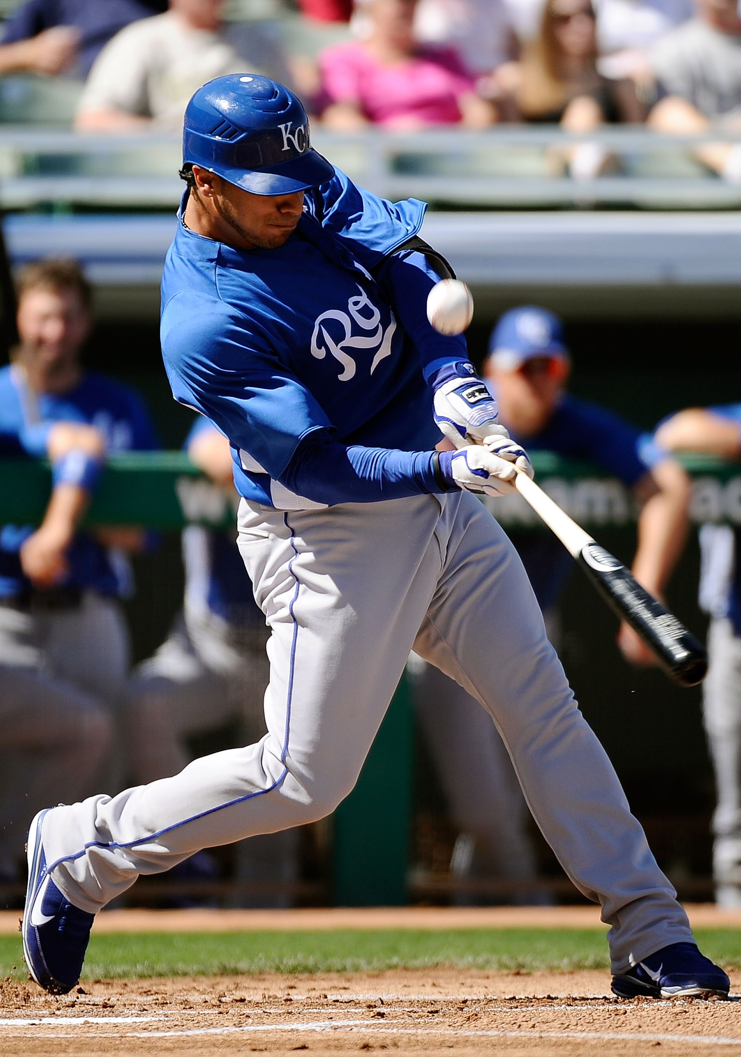 MESA, AZ - MARCH 09:  Mike Aviles #13 of the Kansas City Royals at bat against the Chicago Cubs during the spring training baseball game at HoHoKam Stadium on March 9, 2011 in Mesa, Arizona.  (Photo by Kevork Djansezian/Getty Images)