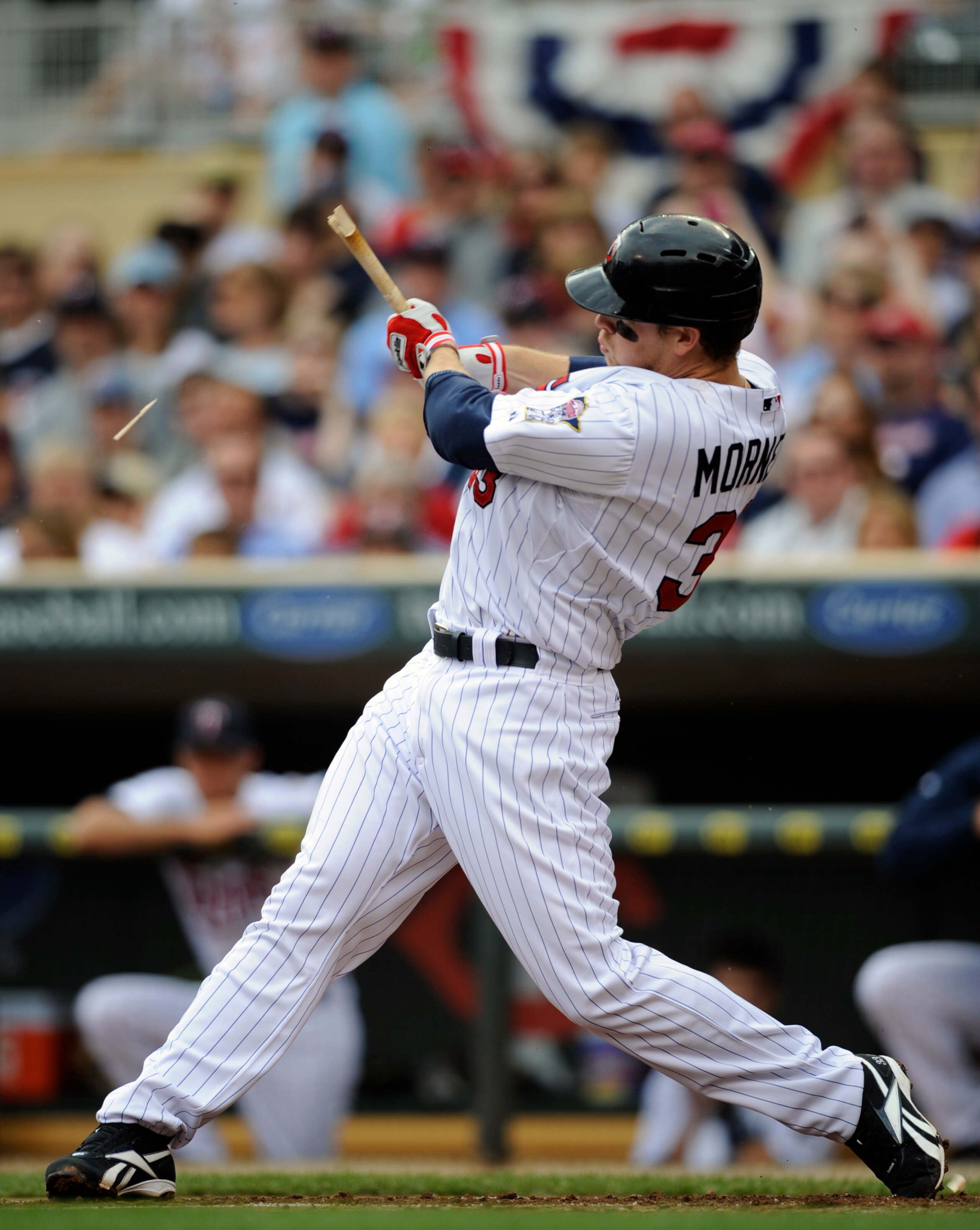 MINNEAPOLIS, MN - APRIL 10: Justin Morneau #33 of the Minnesota Twins breaks his bat against the Oakland Athletics during the first inning a game on April 10, 2011 at Target Field in Minneapolis, Minnesota. (Photo by Hannah Foslien/Getty Images)