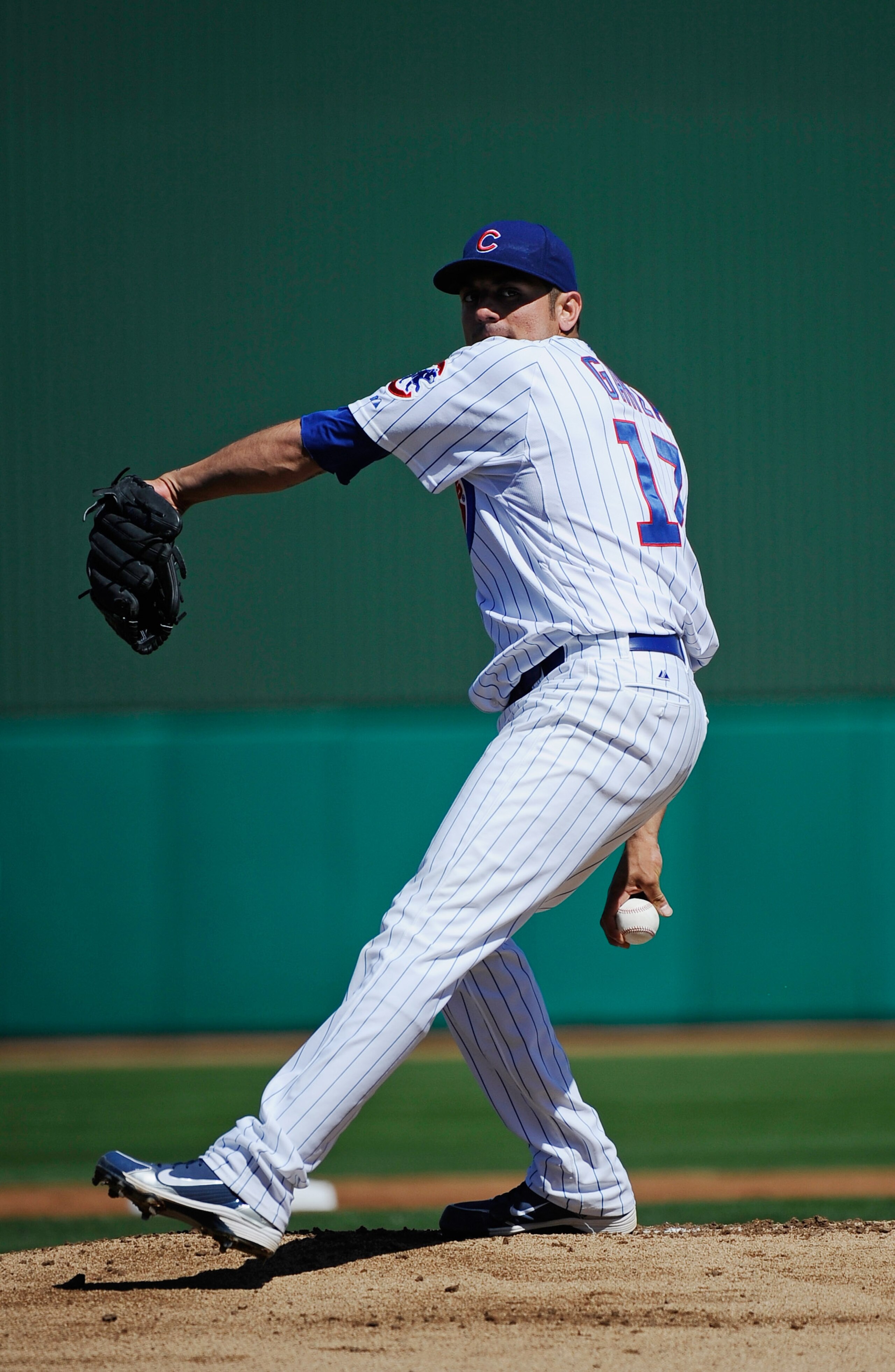 MESA, AZ - MARCH 09:  Matt Garza #17 pitcher of the Chicago Cubs throws a ptich against the Kansas City Royals during the spring training baseball game at HoHoKam Stadium on March 9, 2011 in Mesa, Arizona.  (Photo by Kevork Djansezian/Getty Images)