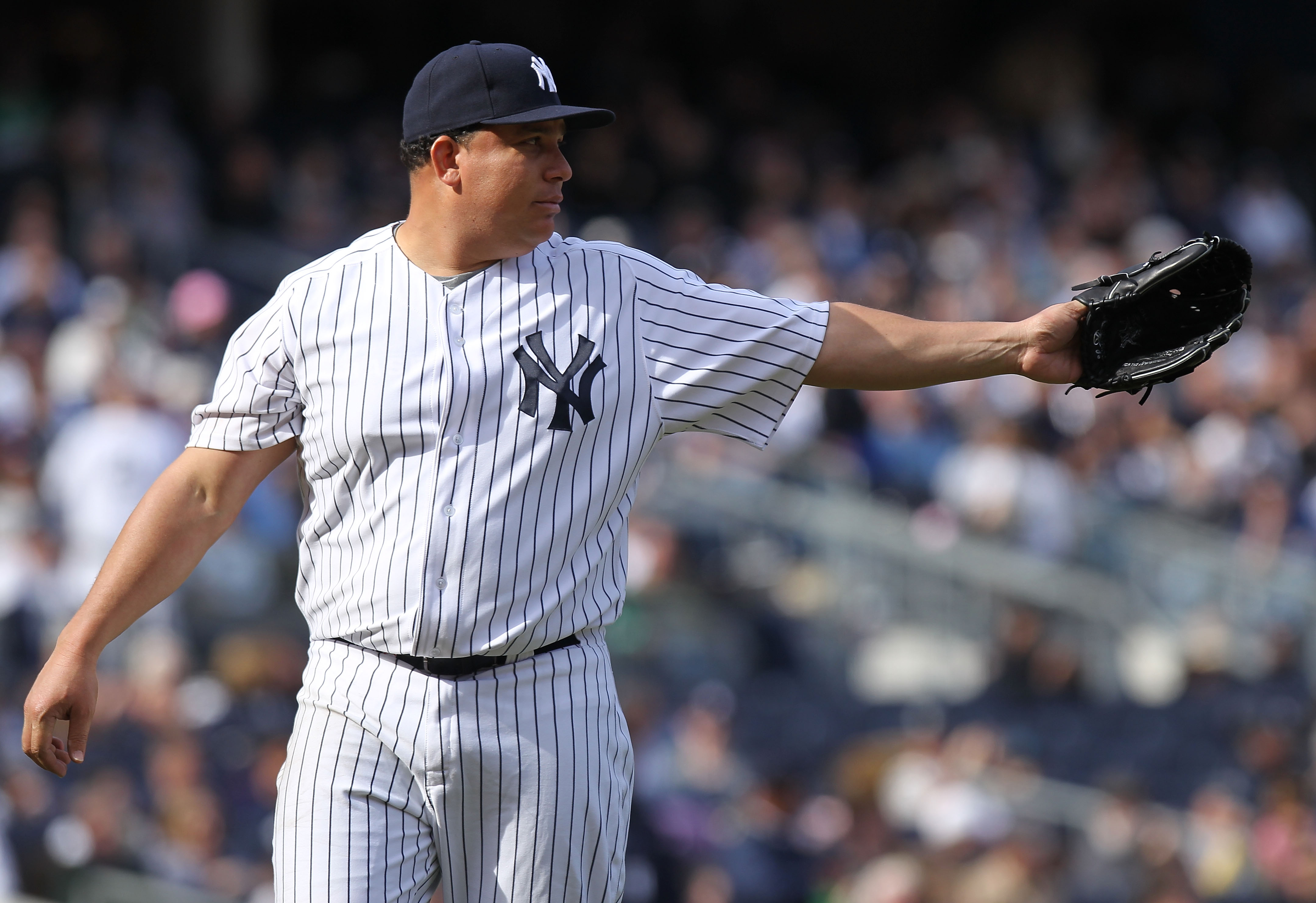 NEW YORK, NY - APRIL 03:  Bartolo Colon #40 of the New York Yankees against the Detroit Tigers at Yankee Stadium on April 3, 2011 in the Bronx borough of New York City.  (Photo by Nick Laham/Getty Images)
