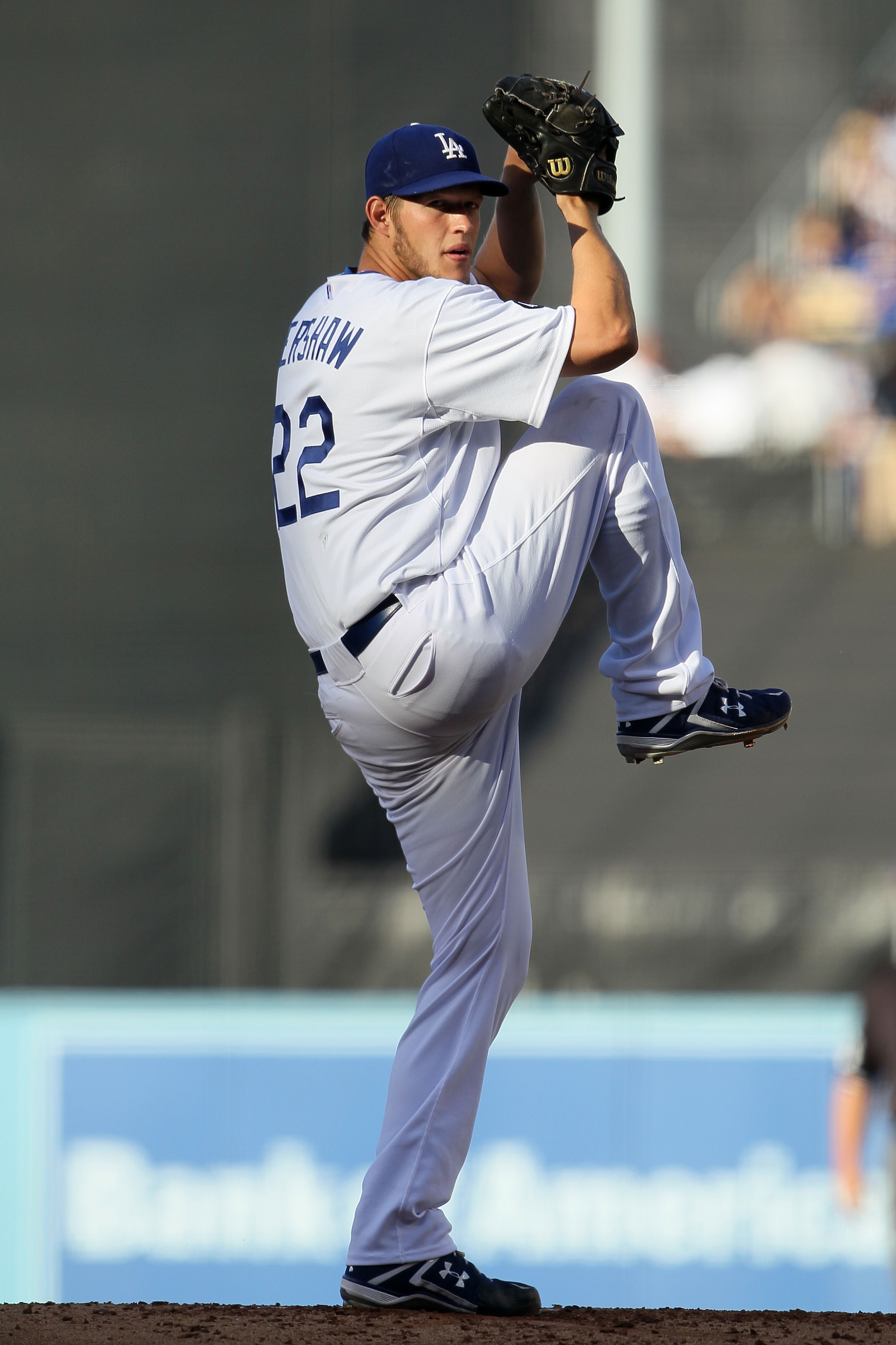 LOS ANGELES, CA - MARCH 31:  Clayton Kershaw #22 of the Los Angeles Dodgers throws a pitch against the San Francisco Giants on Opening Day at Dodger Stadium on March 31, 2011 in Los Angeles, California.  (Photo by Jeff Gross/Getty Images)