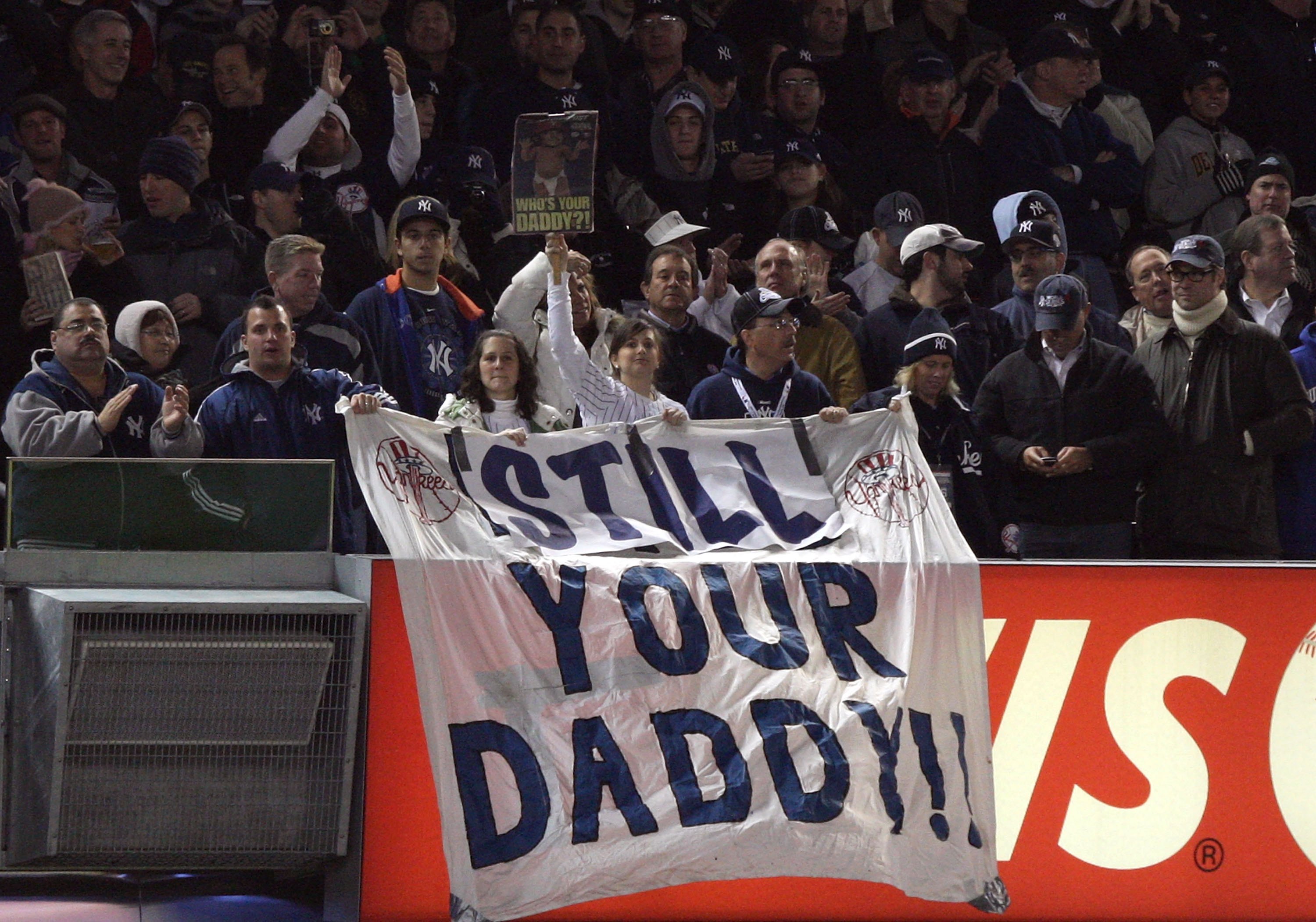 NEW YORK - NOVEMBER 04:  Fans of the New York Yankees hold up a sign which reads 'Still Your Daddy' in reference to Pedro Martinez #45 of the Philadelphia Phillies in Game Six of the 2009 MLB World Series at Yankee Stadium on November 4, 2009 in the Bronx