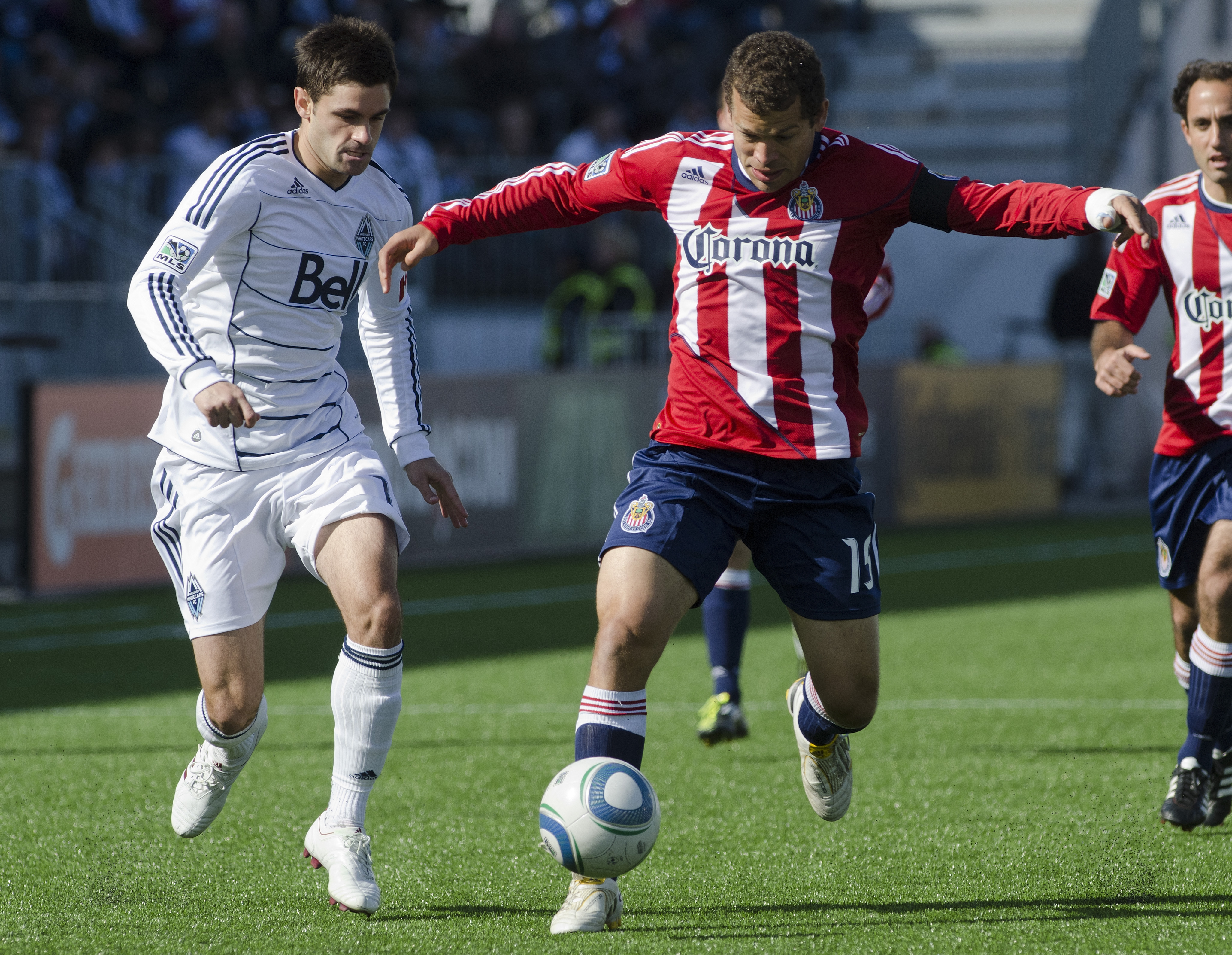 VANCOUVER, CANADA - APRIL 16: Blake Wagner #19 of the Vancouver Whitecaps FC tries to chase down Alejandro Moreno #15 of the Chivas USA during the first half in MLS action on April 16, 2011 at Empire Field in Vancouver, BC, Canada. (Photo by Rich Lam/Get