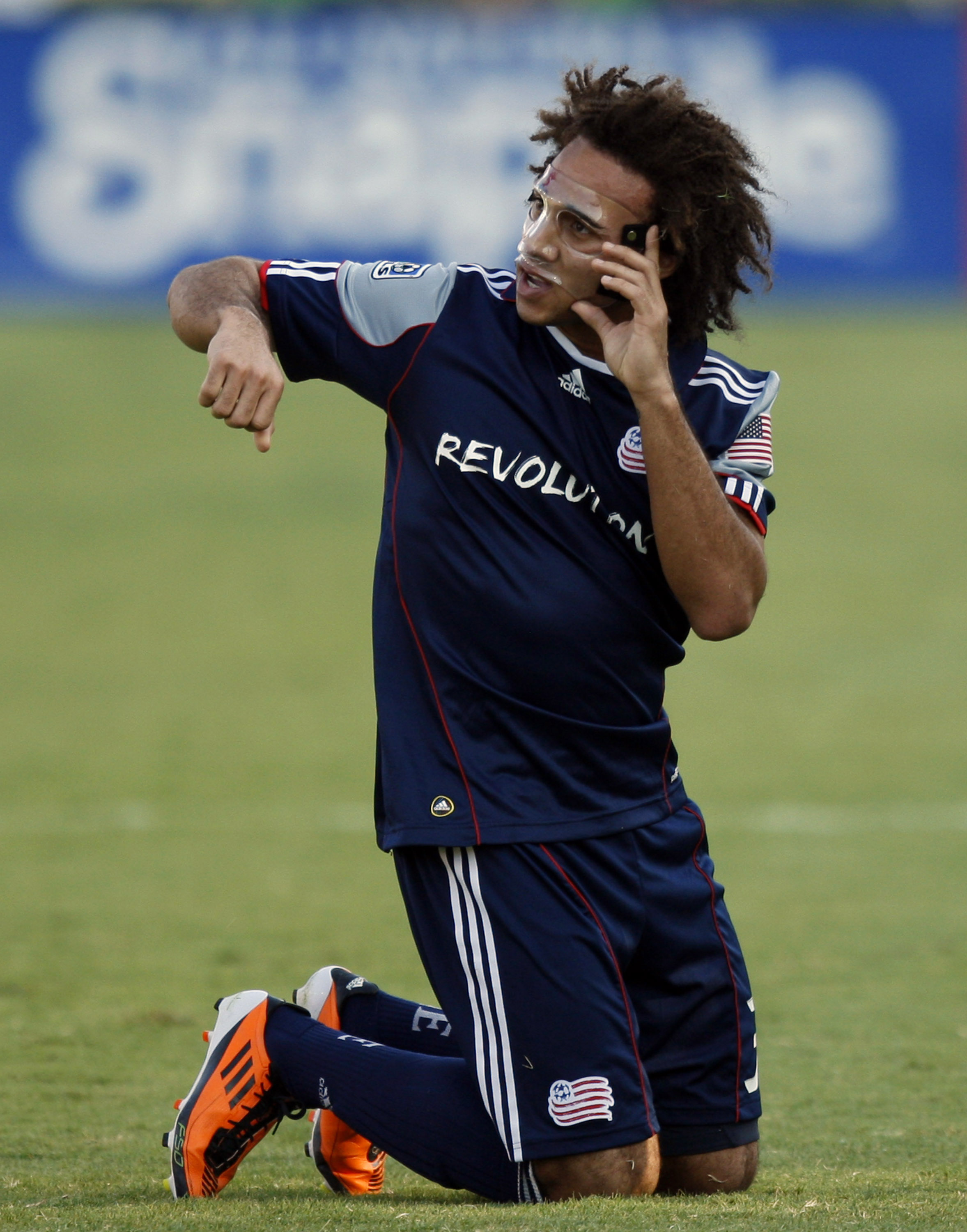 HOUSTON - APRIL 17: Defender Kevin Alston #30 of the New England Revolution complains he was elbowed in the face by a Houston Dynamo player in the first half at Robertson Stadium on April 17, 2011 in Houston, Texas. (Photo by Bob Levey/Getty Images)