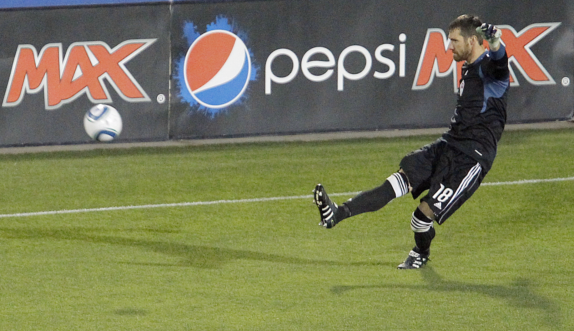 FRISCO, TX - APRIL 8: Goal keeper Matt Pickens #18 of the Colorado Rapids clears the ball from the defensive zone during the second half of a soccer game against FC Dallas at Pizza Hut Park on April 8, 2011 in Frisco, Texas. FC Dallas won 3-0. (Photo by B