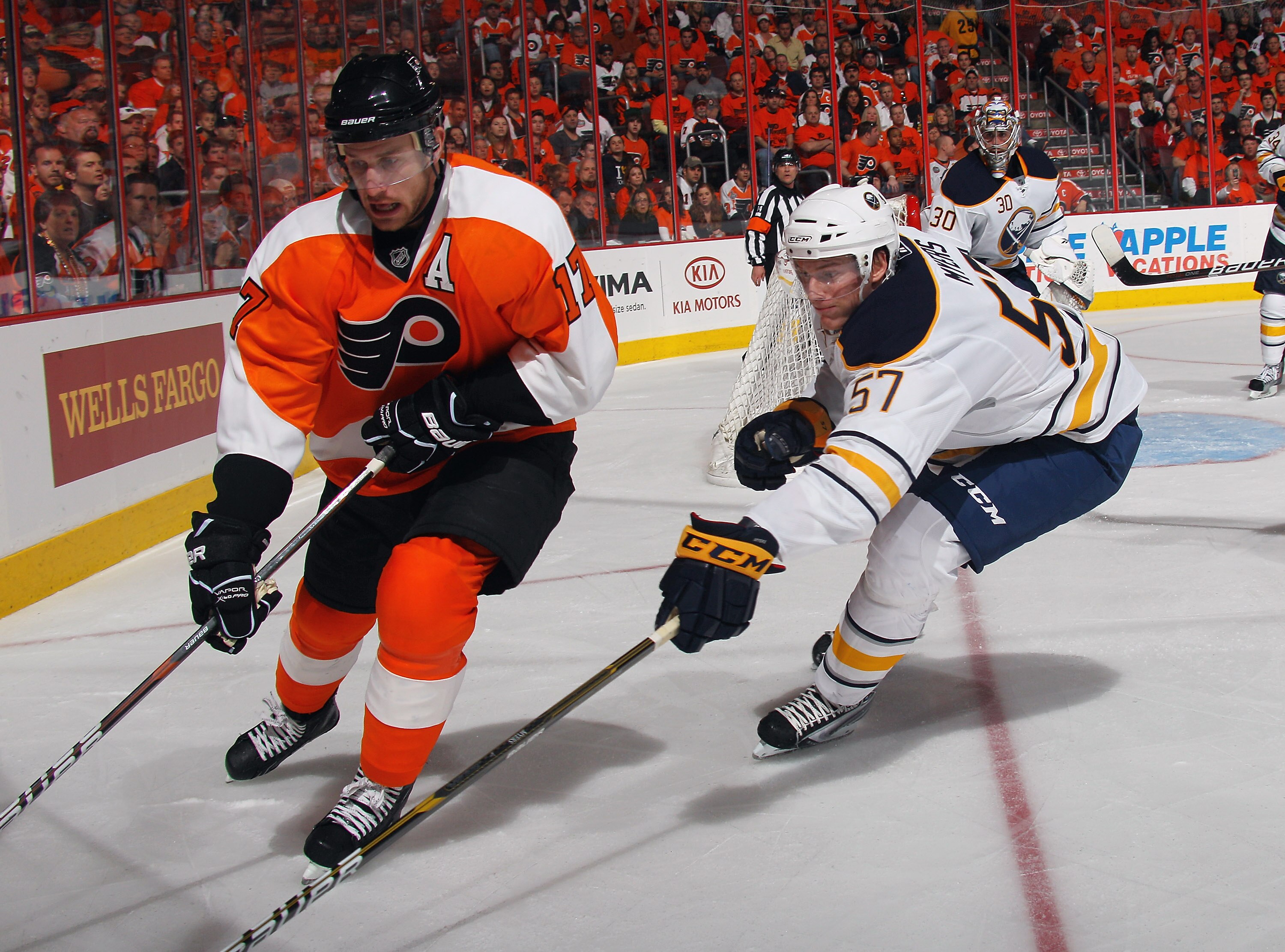 PHILADELPHIA, PA - APRIL 14: Tyler Myers #57 of the Buffalo Sabres checks Jeff Carter #17 of the Philadelphia Flyers in Game One of the Eastern Conference Quarterfinals during the 2011 NHL Stanley Cup Playoffs at Wells Fargo Center on April 14, 2011 in Ph