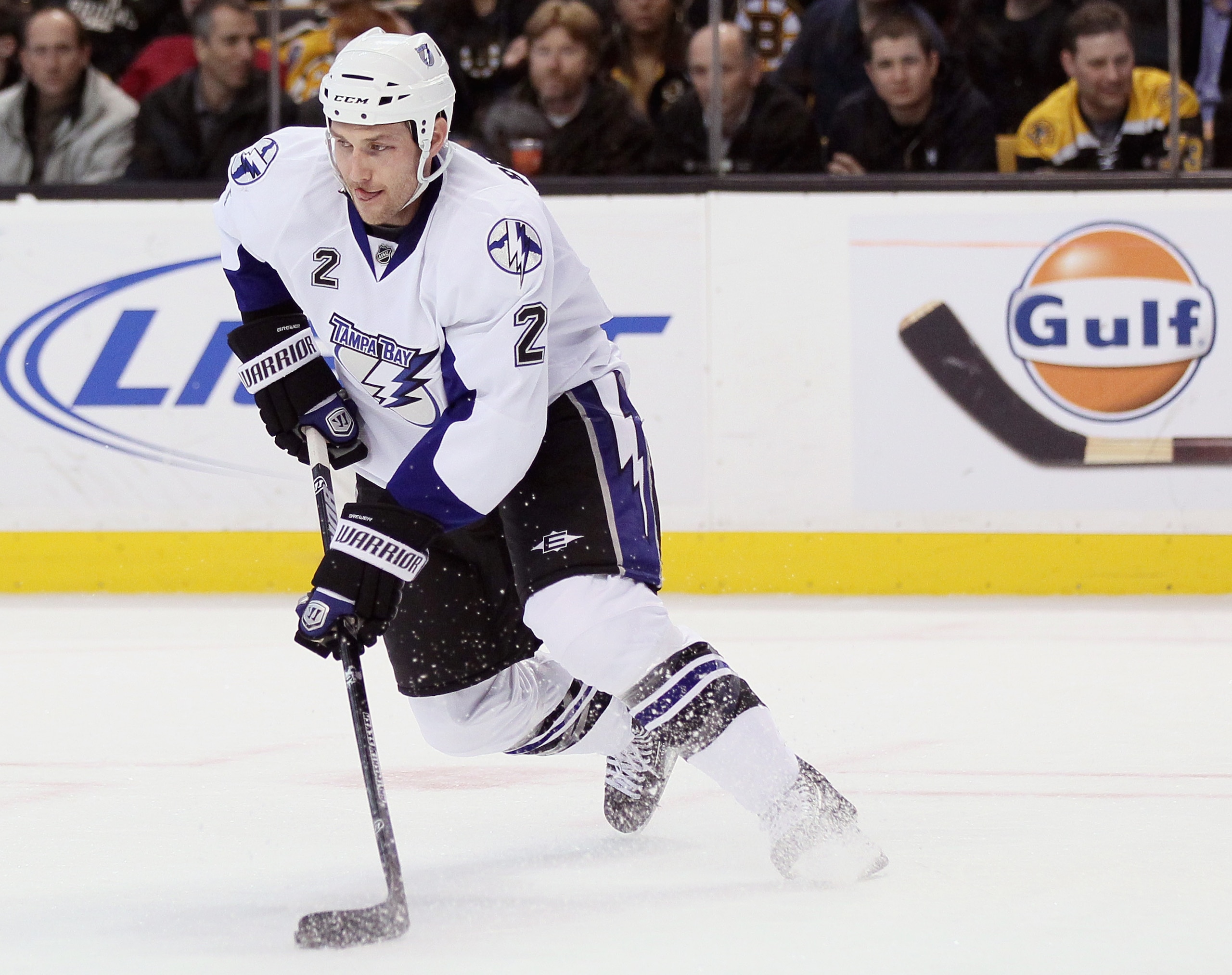 BOSTON, MA - MARCH 03: Eric Brewer #2 of the Tampa Bay Lightning takes the puck in the third period against the Boston Bruins on March 3, 2011 at the TD Garden in Boston, Massachusetts. The Boston Bruins defeated the Tampa Bay Lightning 2-1. (Photo by E BOSTON, MA - MARCH 03: Eric Brewer #2 of the Tampa Bay Lightning takes the puck in the third period against the Boston Bruins on March 3, 2011 at the TD Garden in Boston, Massachusetts. The Boston Bruins defeated the Tampa Bay Lightning 2-1. (Photo by E