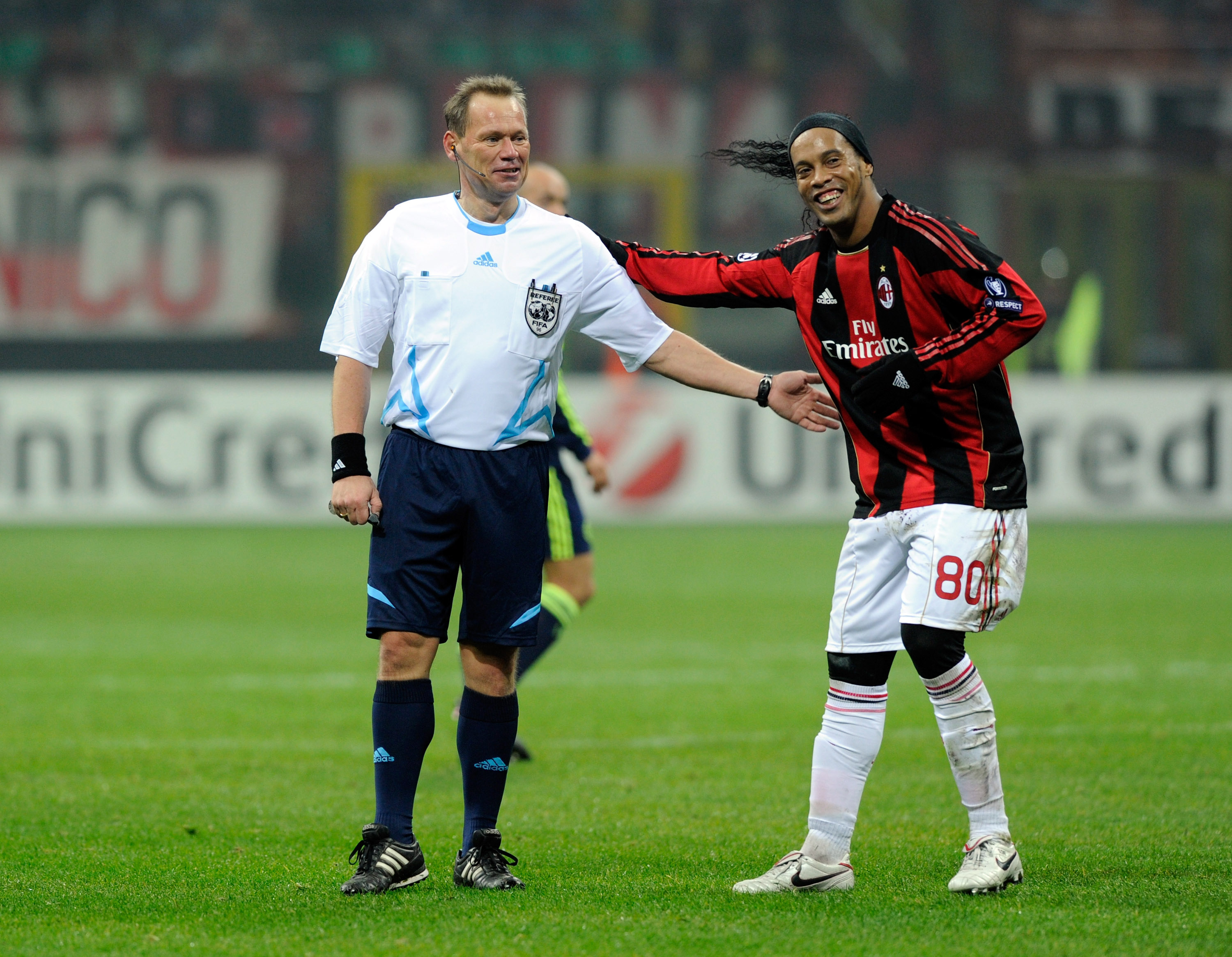 MILAN, ITALY - DECEMBER 08:  Referee Claus Bo Larsen and Ronaldinho of AC Milan during the UEFA Champions League Group G match between AC Milan and AFC Ajax at Stadio Giuseppe Meazza on December 8, 2010 in Milan, Italy.  (Photo by Claudio Villa/Getty Imag