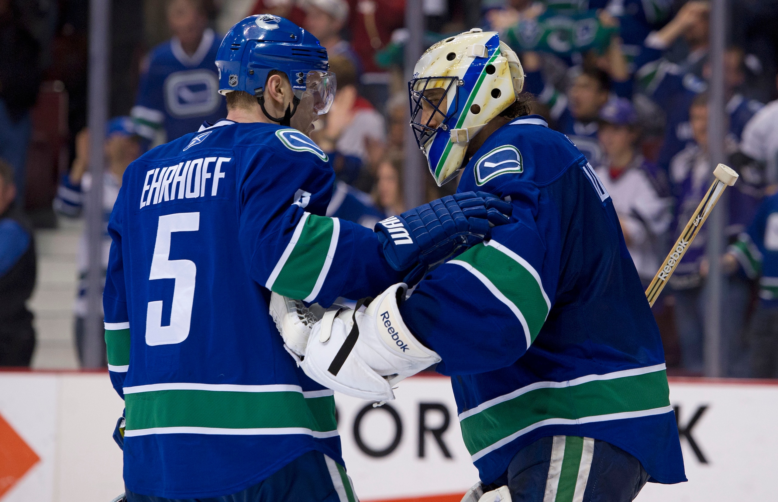 VANCOUVER, CANADA - MARCH 31: Goalie Roberto Luongo #1 of the Vancouver Canucks is congratulated by Christian Ehrhoff #5 after defeating the Los Angeles Kings in NHL action on March 31, 2011 at Rogers Arena in Vancouver, BC, Canada. (Photo by Rich Lam/Ge VANCOUVER, CANADA - MARCH 31: Goalie Roberto Luongo #1 of the Vancouver Canucks is congratulated by Christian Ehrhoff #5 after defeating the Los Angeles Kings in NHL action on March 31, 2011 at Rogers Arena in Vancouver, BC, Canada. (Photo by Rich Lam/Ge
