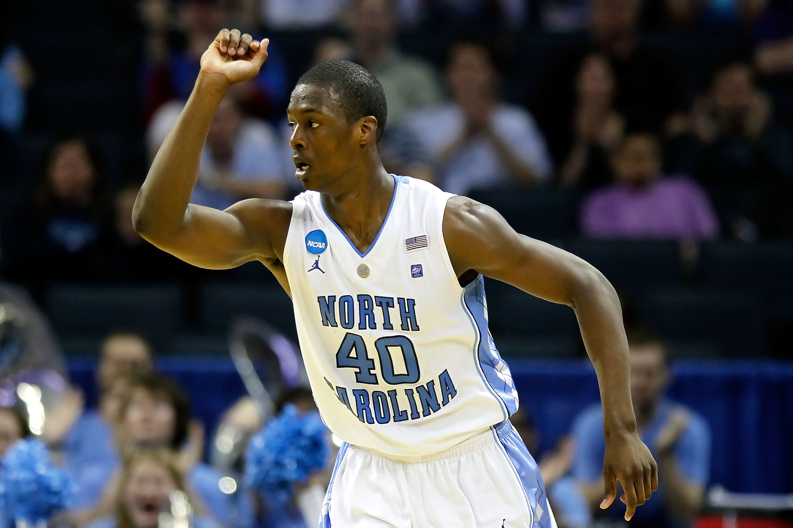 CHARLOTTE, NC - MARCH 18:  Harrison Barnes #40 of the North Carolina Tar Heels reacts after making a three-pointer in the second half while taking on the Long Island Blackbirds during the second round of the 2011 NCAA men's basketball tournament at Time W