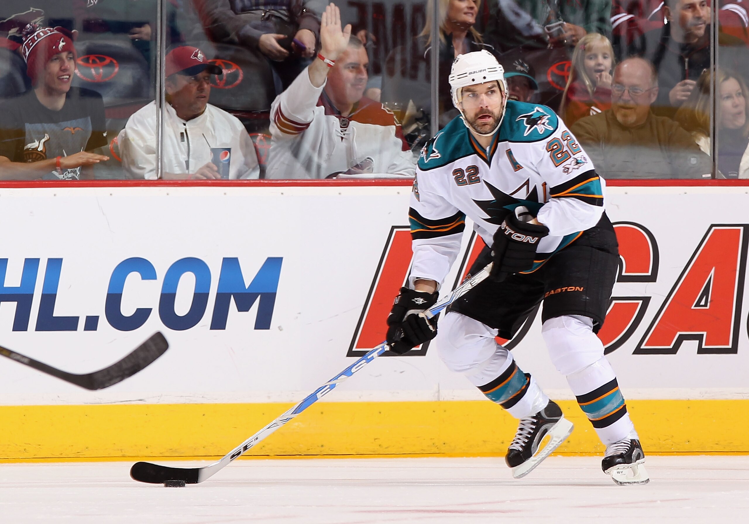 GLENDALE, AZ - MARCH 26: Dan Boyle #22 of the San Jose Sharks skates with the puck during the NHL game against the Phoenix Coyotes at Jobing.com Arena on March 26, 2011 in Glendale, Arizona. The Sharks defeated the Coyotes 4-1. (Photo by Christian Peter GLENDALE, AZ - MARCH 26: Dan Boyle #22 of the San Jose Sharks skates with the puck during the NHL game against the Phoenix Coyotes at Jobing.com Arena on March 26, 2011 in Glendale, Arizona. The Sharks defeated the Coyotes 4-1. (Photo by Christian Peter