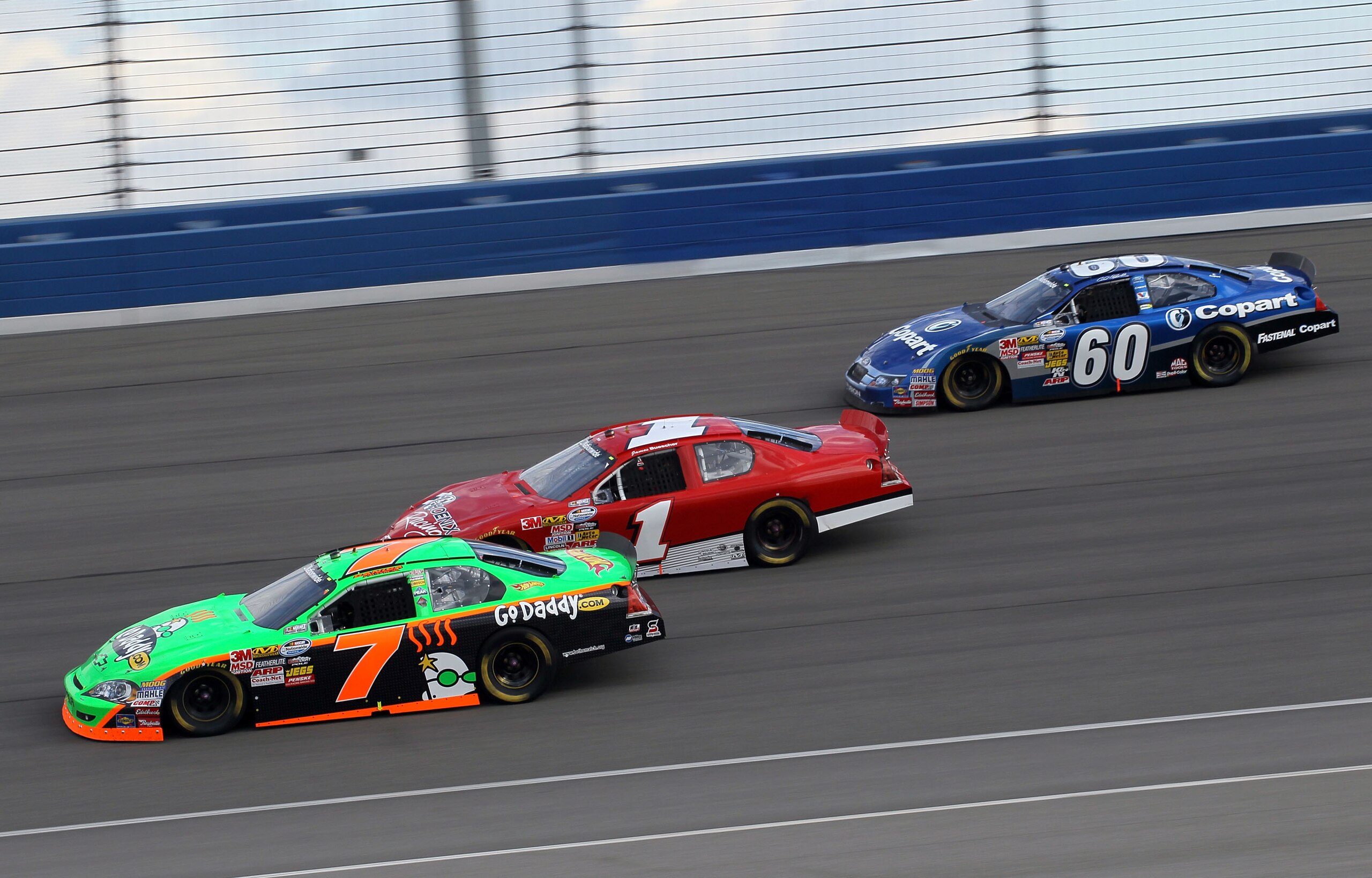 FONTANA, CA - FEBRUARY 20: Danica Patrick, driver of the #7 GoDaddy.com Chevrolet, leads James Buescher, driver of the #1 Phoenix Racing Chevrolet, and Carl Edwards, driver of the #60 Copart Ford, during the NASCAR Nationwide Series Stater Bros. 300 at A FONTANA, CA - FEBRUARY 20: Danica Patrick, driver of the #7 GoDaddy.com Chevrolet, leads James Buescher, driver of the #1 Phoenix Racing Chevrolet, and Carl Edwards, driver of the #60 Copart Ford, during the NASCAR Nationwide Series Stater Bros. 300 at A