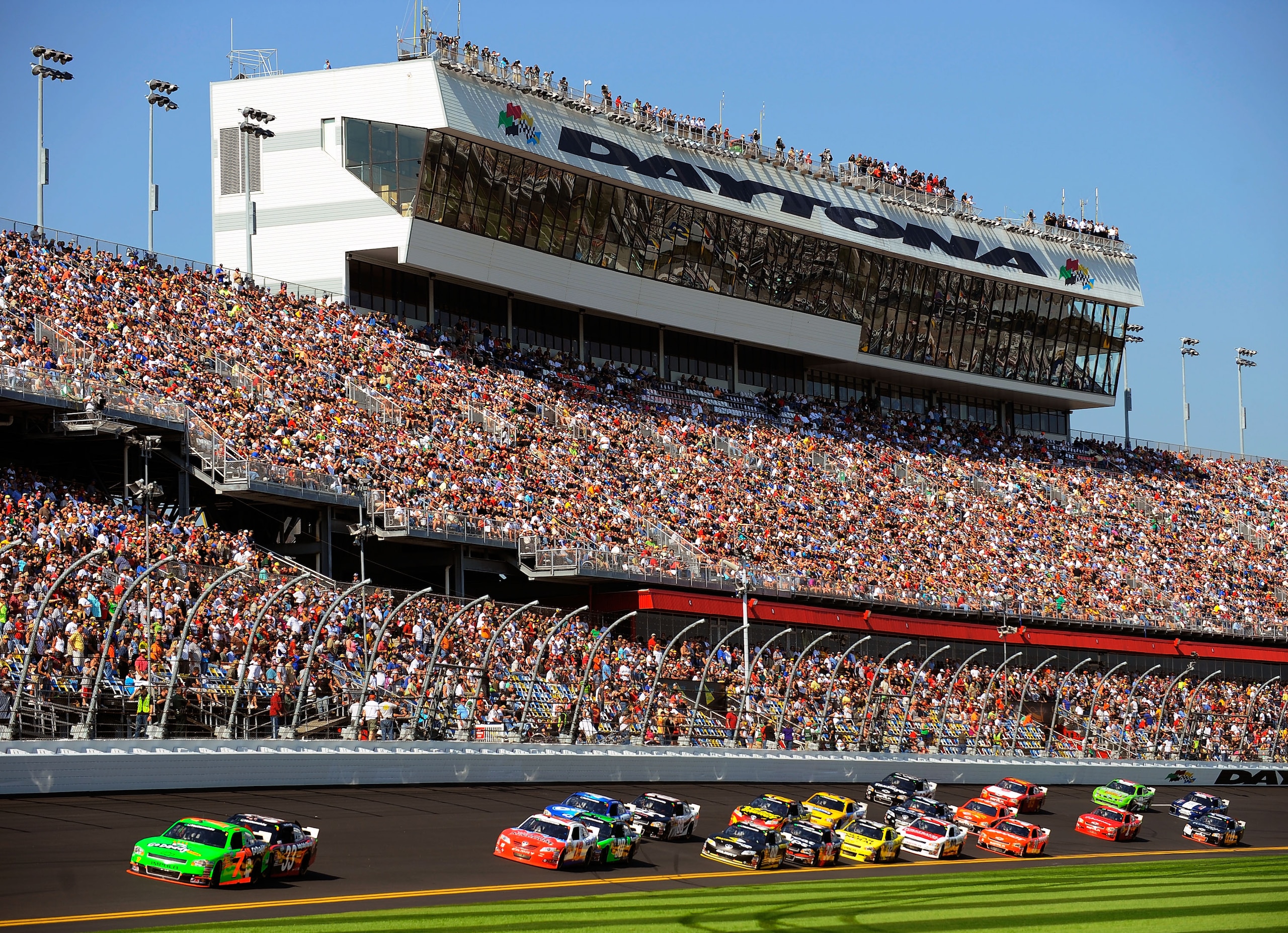 DAYTONA BEACH, FL - FEBRUARY 19: Danica Patrick, driver of the #7 GoDaddy.com Chevrolet, and Clint Bowyer, driver of the #33 Rheem Heating, Cooling & Water Heating Chevrolet, lead a group of cars during the NASCAR Nationwide Series DRIVE4COPD 300 at Dayt DAYTONA BEACH, FL - FEBRUARY 19: Danica Patrick, driver of the #7 GoDaddy.com Chevrolet, and Clint Bowyer, driver of the #33 Rheem Heating, Cooling & Water Heating Chevrolet, lead a group of cars during the NASCAR Nationwide Series DRIVE4COPD 300 at Dayt