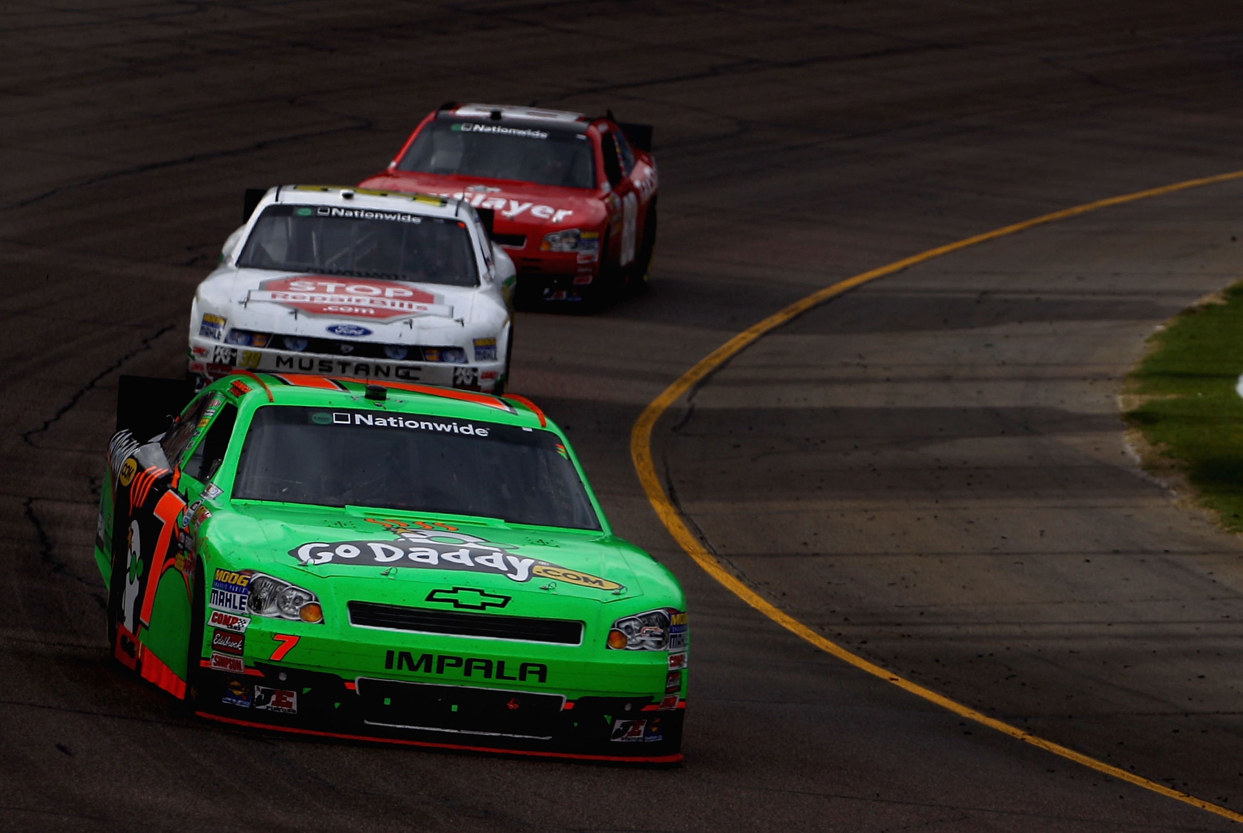 AVONDALE, AZ - FEBRUARY 26: Danica Patrick, driver of the #7 GoDaddy.com Chevrolet, races during the NASCAR Nationwide Series Bashas' Supermarkets 200 at Phoenix International Raceway on February 26, 2011 in Avondale, Arizona. (Photo by Christian Peters AVONDALE, AZ - FEBRUARY 26: Danica Patrick, driver of the #7 GoDaddy.com Chevrolet, races during the NASCAR Nationwide Series Bashas' Supermarkets 200 at Phoenix International Raceway on February 26, 2011 in Avondale, Arizona. (Photo by Christian Peters