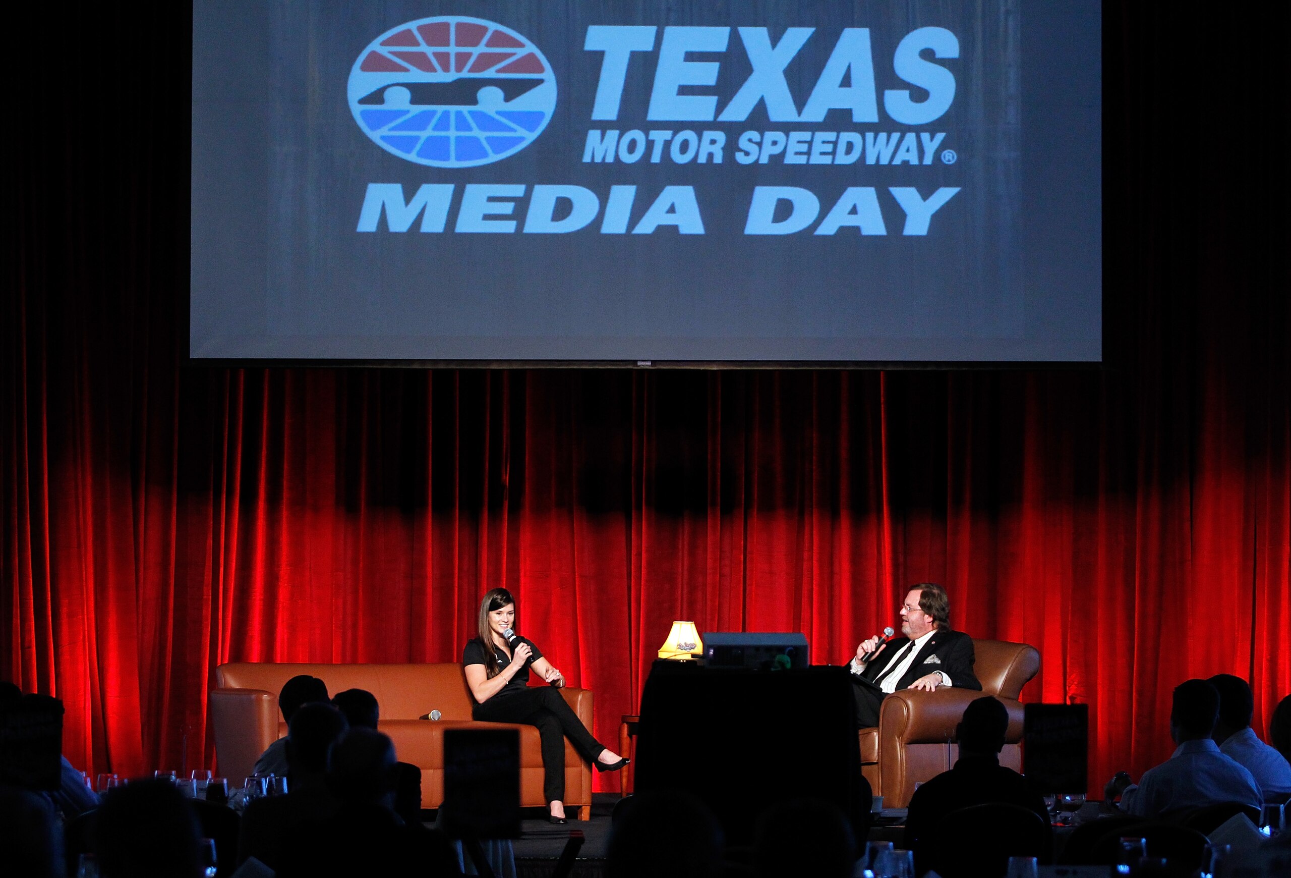 FORT WORTH, TX - MARCH 02: Danica Patrick, driver of the #7 GoDaddy.com Chevrolet and the #7 Andretti Motorsport Team GoDaddy.com Dallara Honda talks with Texas Motor Speedway President Eddie Gossage during Media Day at Texas Motor Speedway on March 2, 2 FORT WORTH, TX - MARCH 02: Danica Patrick, driver of the #7 GoDaddy.com Chevrolet and the #7 Andretti Motorsport Team GoDaddy.com Dallara Honda talks with Texas Motor Speedway President Eddie Gossage during Media Day at Texas Motor Speedway on March 2, 2