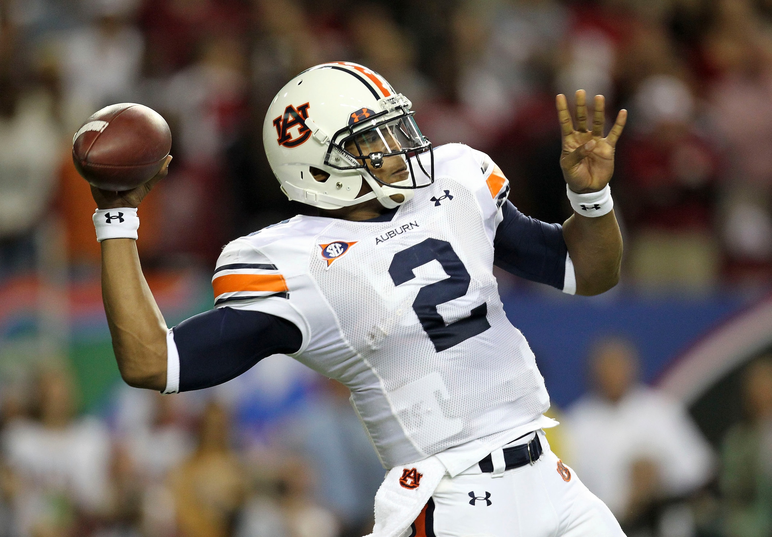 ATLANTA - DECEMBER 4:  Quarterback Cam Newton #2 of the Auburn Tigers throws a pass during the 2010 SEC Championship against the South Carolina Gamecocks at Georgia Dome on December 4, 2010 in Atlanta, Georgia. (Photo by Mike Zarrilli/Getty Images)