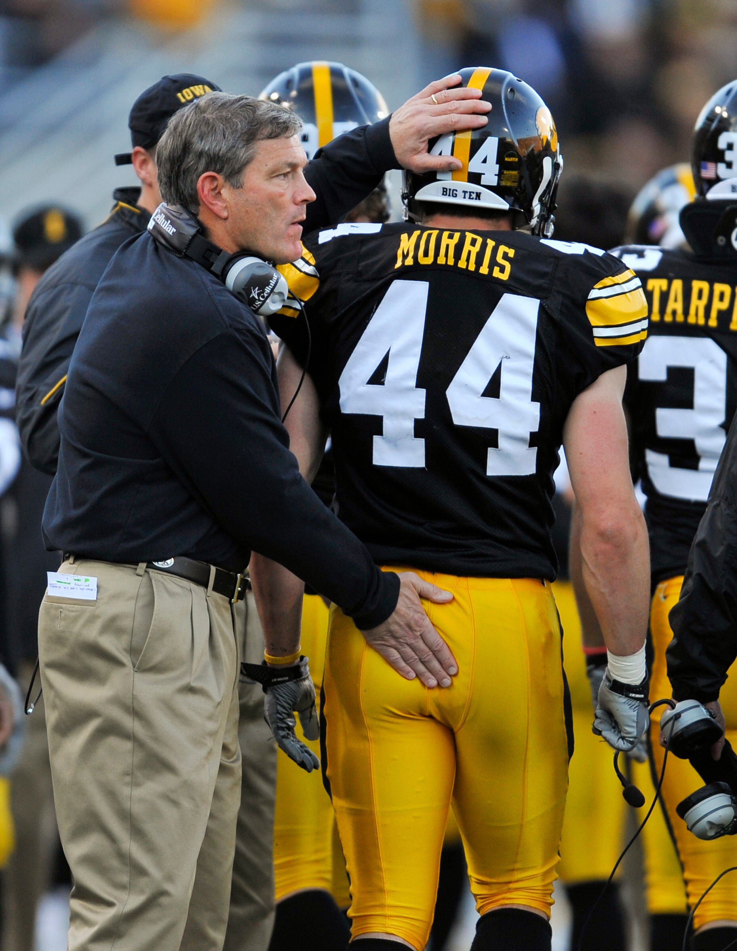 IOWA CITY, IA - OCTOBER 30- Head coach Kirk Ferentz of the University of Iowa Hawkeyes celebrates with linebacker James Morris #44 during the Michigan State Spartans NCAA college football game at Kinnick Stadium on October 30, 2010 in Iowa City, Iowa. Iow