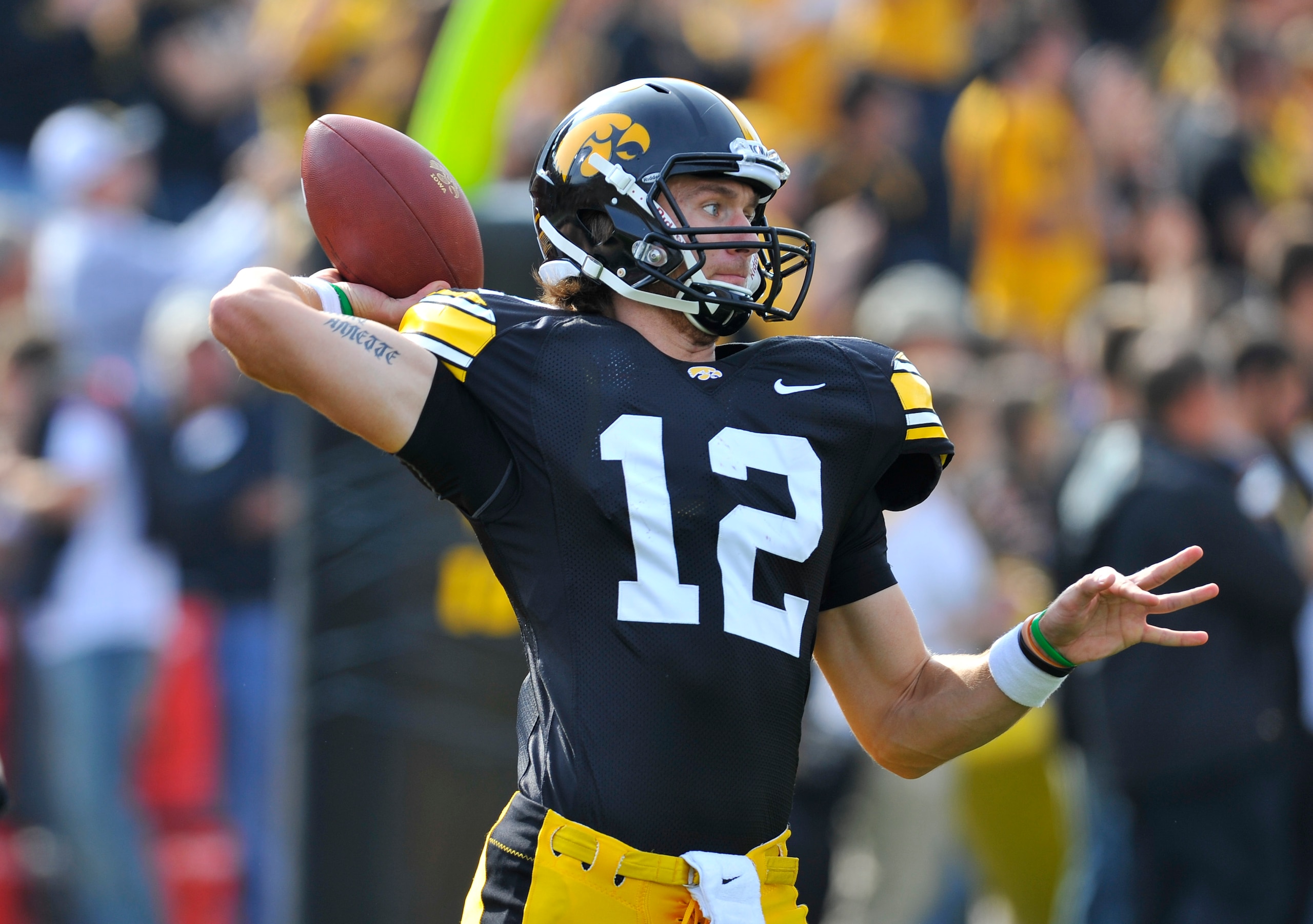 IOWA CITY, IA - OCTOBER 23- Quarterback Ricky Stanzi #12 of the University of Iowa Hawkeyes warms up before action against the Wisconsin Badgers at Kinnick Stadium on October 23, 2010 in Iowa City, Iowa. Wisconsin won 31-30 over Iowa. (Photo by David Purd