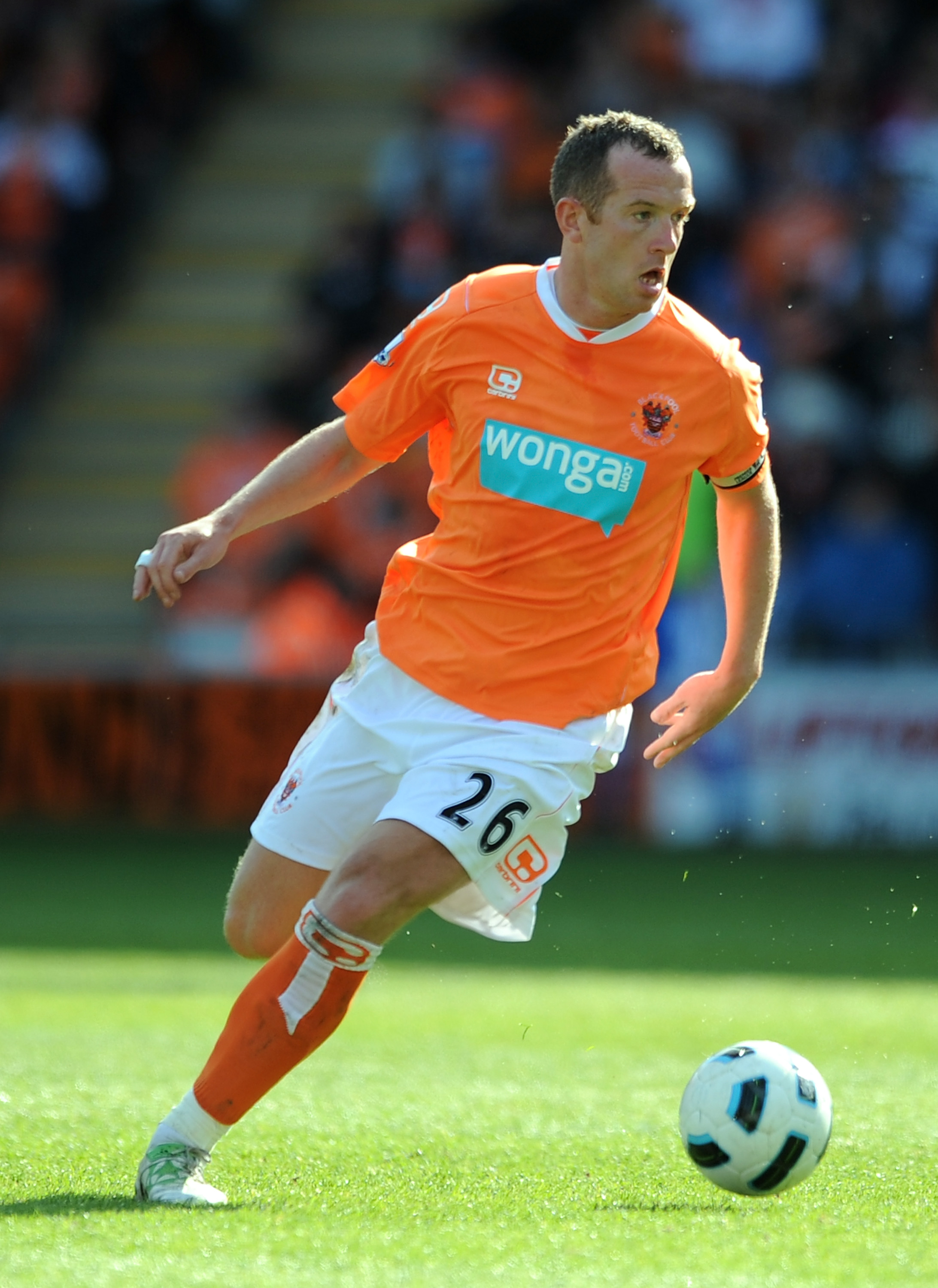 BLACKPOOL, ENGLAND - APRIL 16:  Charlie Adam of Blackpool in action during the Barclays Premier League match between Blackpool and Wigan Athletic at Bloomfield Road on April 16, 2011 in Blackpool, England.  (Photo by Chris Brunskill/Getty Images)