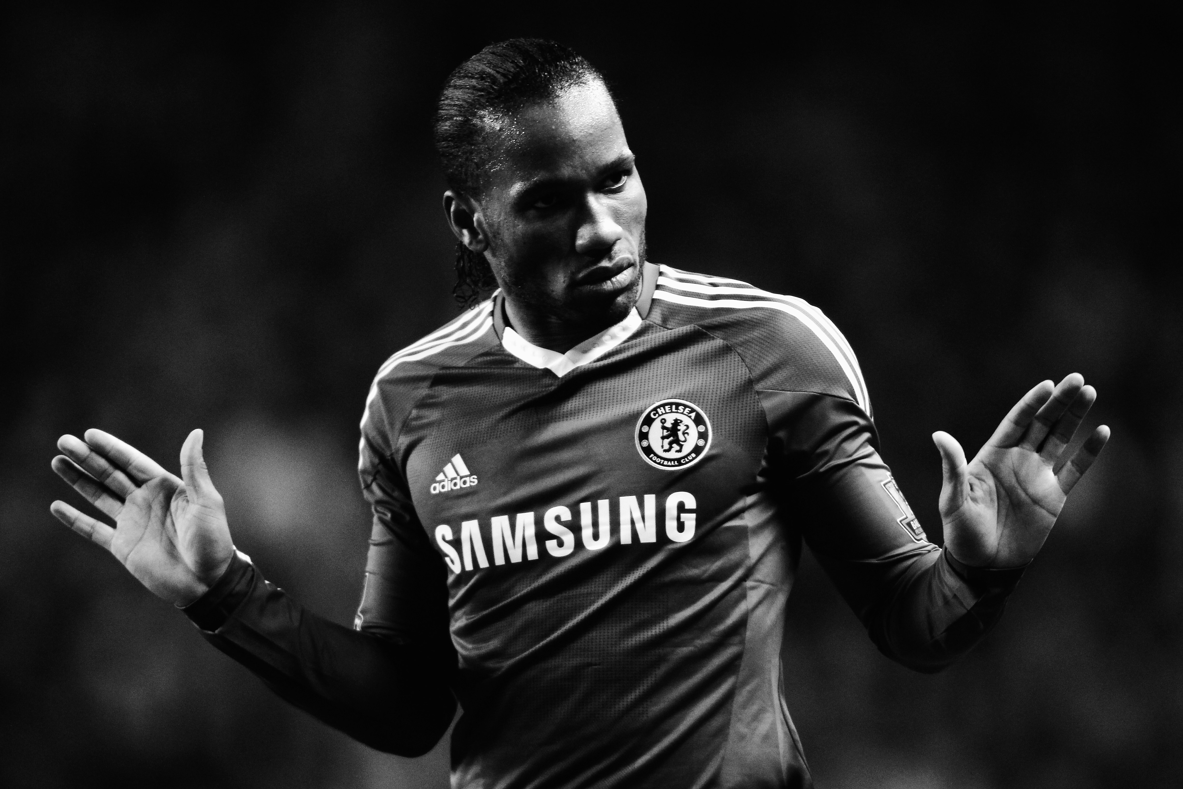 WOLVERHAMPTON, UNITED KINGDOM - JANUARY 05:  (EDITORS NOTE: THIS BLACK AND WHITE IMAGE WAS CREATED FROM ORIGINAL COLOUR FILE)  Didier Drogba of Chelsea reacts during the Barclays Premier League match between Wolverhampton Wanderers and Chelsea at Molineux