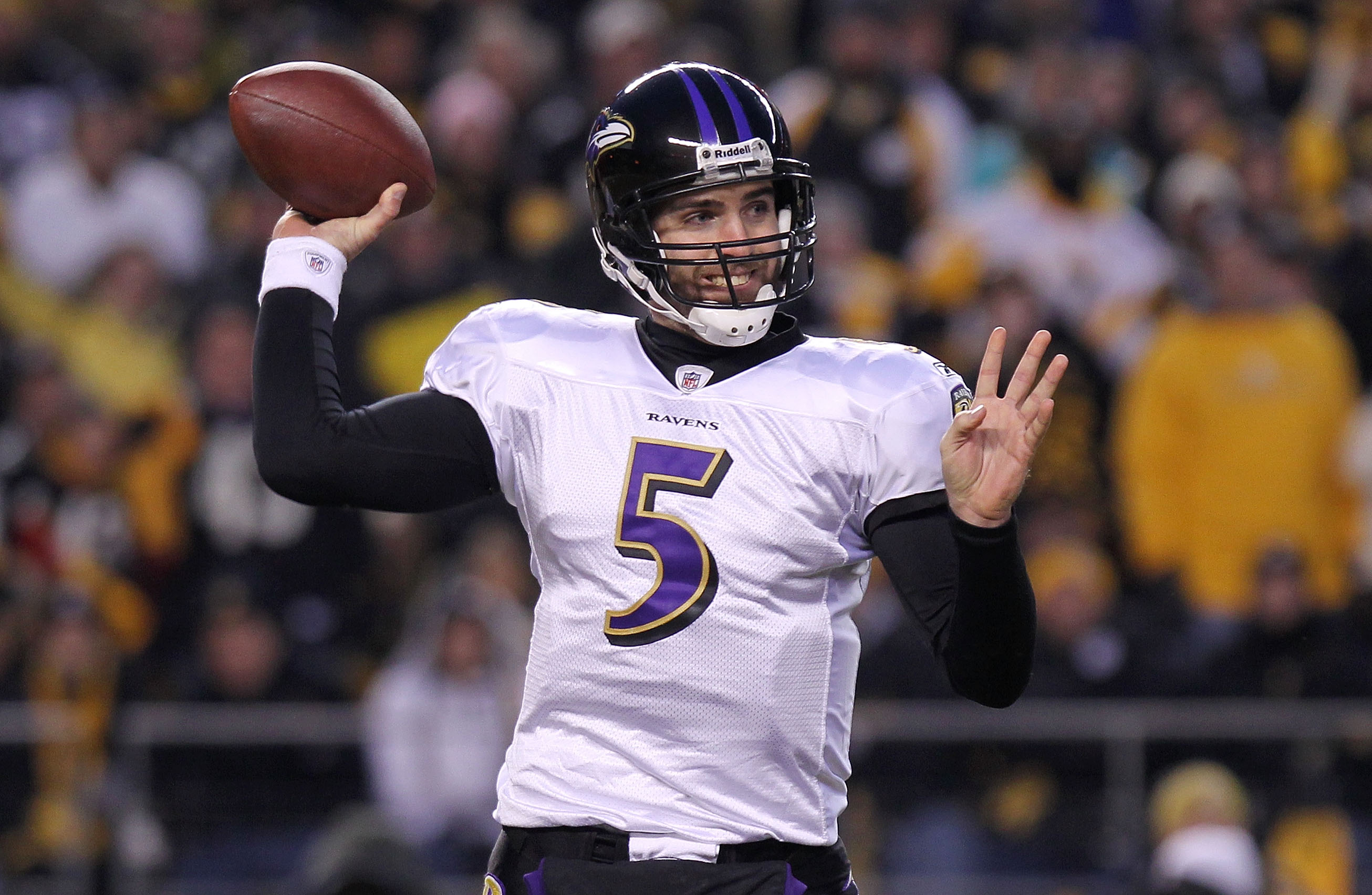 PITTSBURGH, PA - JANUARY 15:  Quarterback Joe Flacco #5 of the Baltimore Ravens looks to pass against the Pittsburgh Steelers in the AFC Divisional Playoff Game at Heinz Field on January 15, 2011 in Pittsburgh, Pennsylvania.  (Photo by Nick Laham/Getty Im