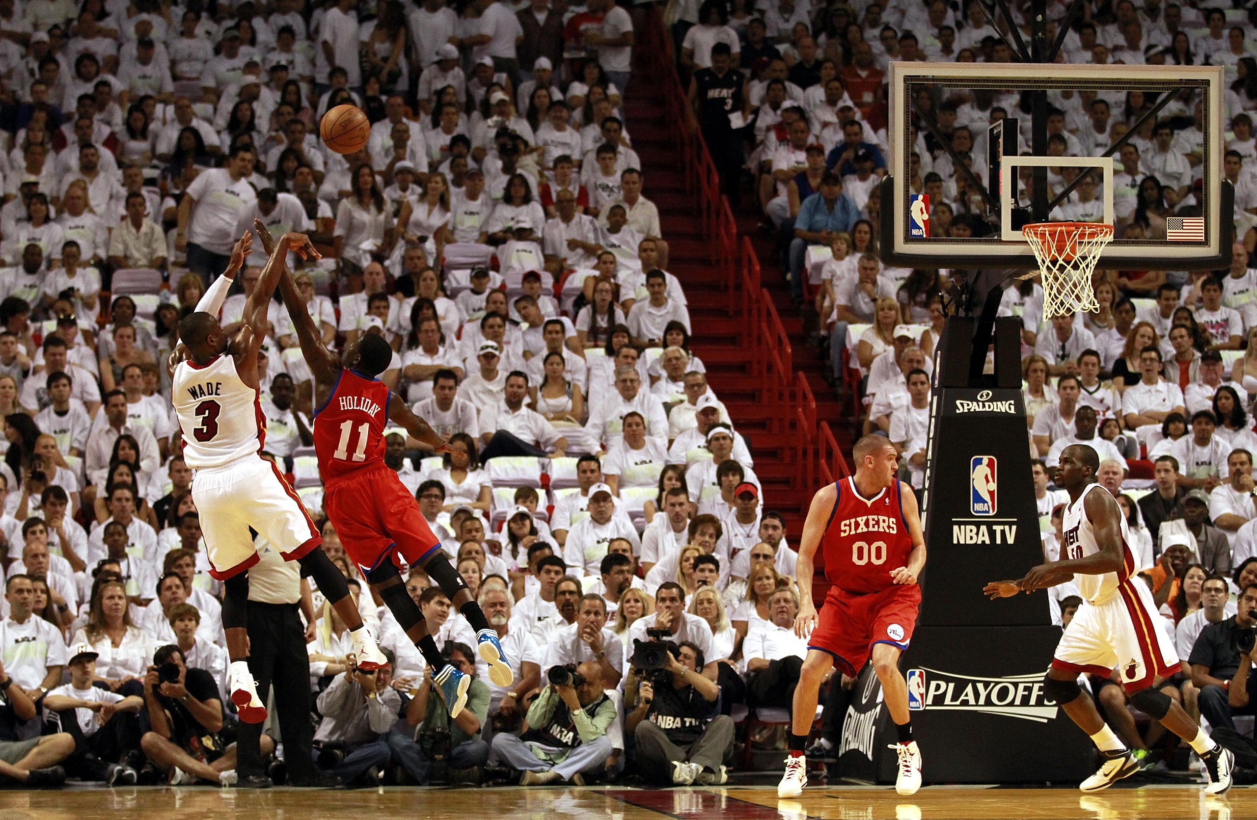 MIAMI, FL - APRIL 16:  Guard Dwyane Wade #3 of the Miami Heat plays against the Philadelphia 76ers at the American Airlines Arena in Game One of the Eastern Conference Quarterfinals in the 2011 NBA Playoffs on April 16, 2011 in Miami, Florida. The Heat de