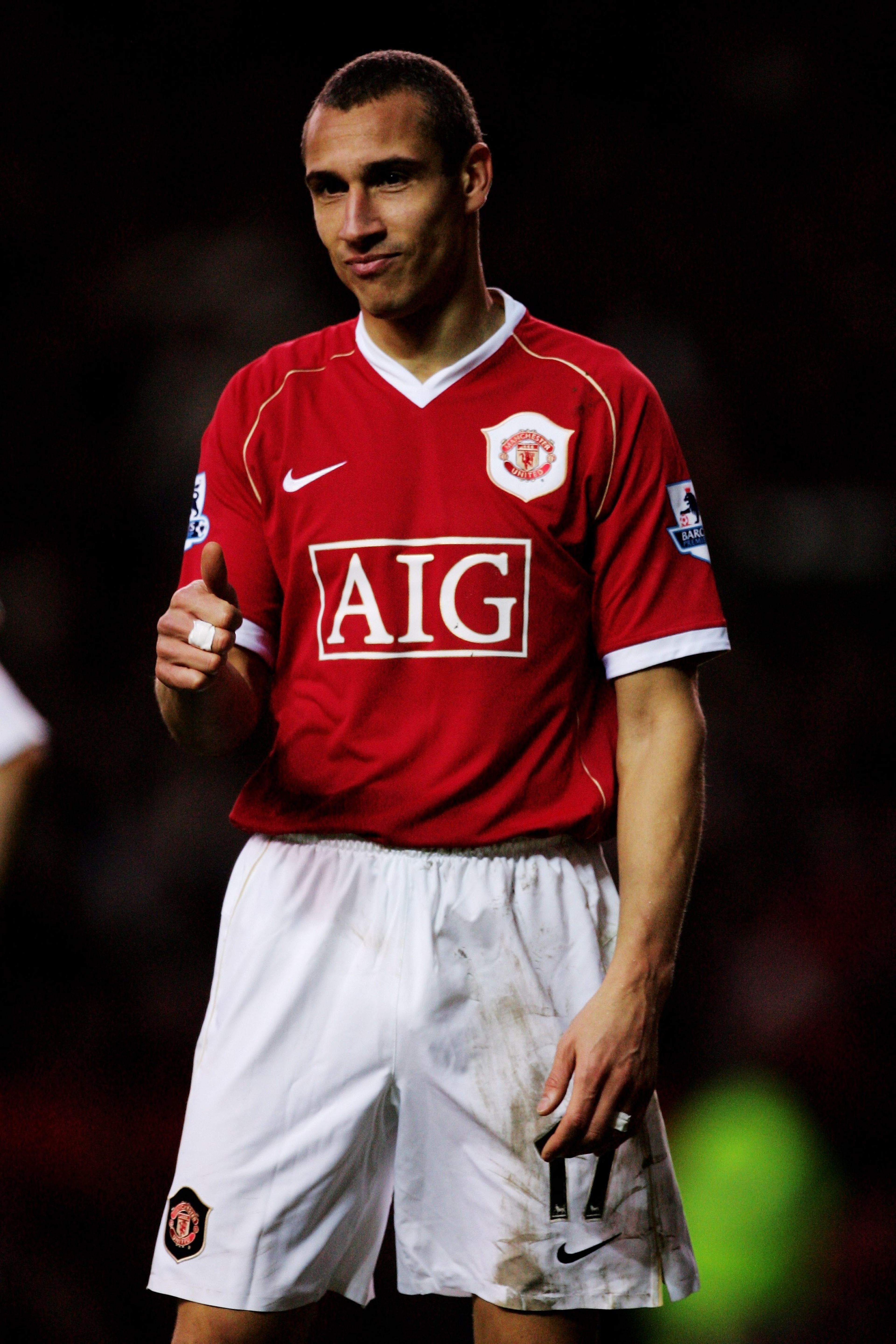 MANCHESTER, UNITED KINGDOM - JANUARY 13:  Henrik Larsson of Manchester United gives a thumbs up to a team mate during the Barclays Premiership match between Manchester United and Aston Villa at Old Trafford on January 13, 2007 in Manchester, England.  (Ph