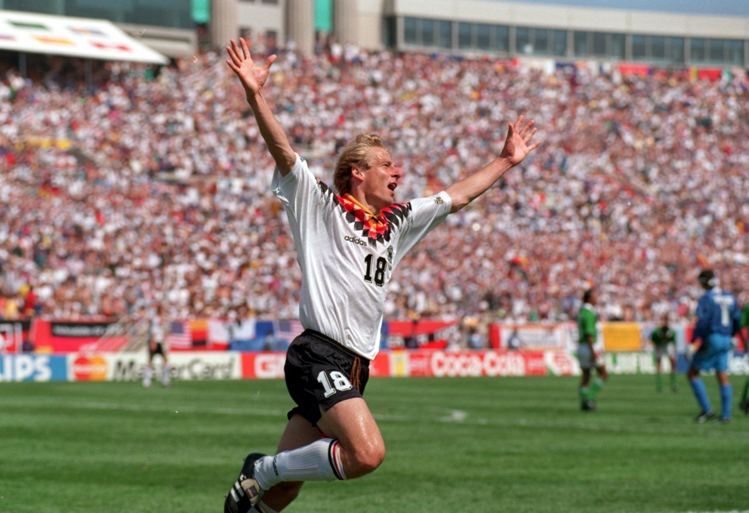 17 JUN 1994:  JUERGEN KLINSMANN OF GERMANY CELEBRATES AFTER SCORING THE ONLY GOAL AGAINST BOLIVIA IN THE OPENING GAME OF THE 1994 WORLD CUP AT SOLDIER FIELD IN CHICAGO, ILLINOIS. Mandatory Credit: Shaun Botterill/ALLSPORT