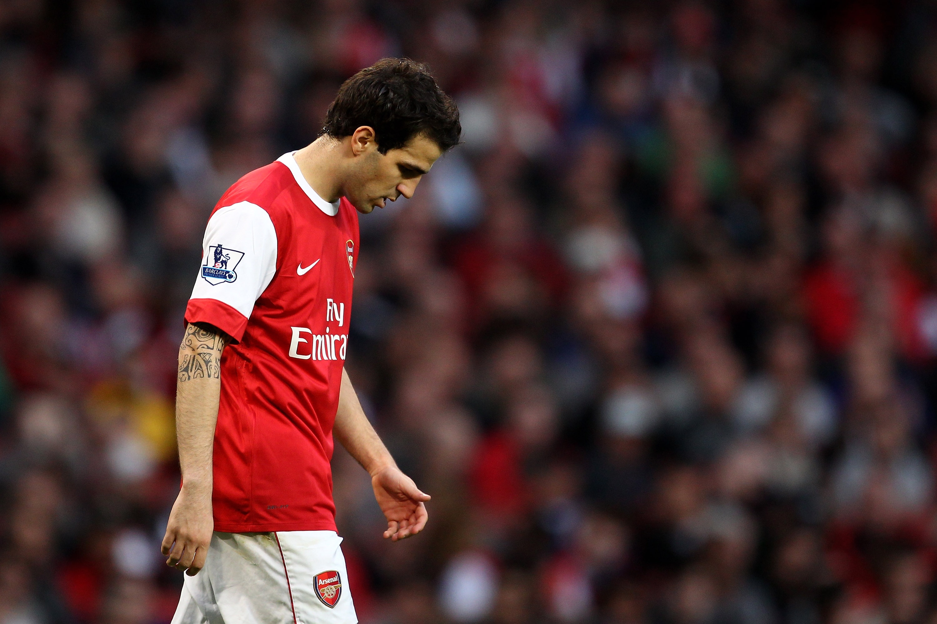 LONDON, ENGLAND - APRIL 02: Cesc Fabregas of Arsenal walks dejectedduring the Barclays Premier League match between Arsenal and Blackburn Rovers at the Emirates Stadium on April 2, 2011 in London, England. (Photo by Julian Finney/Getty Images)