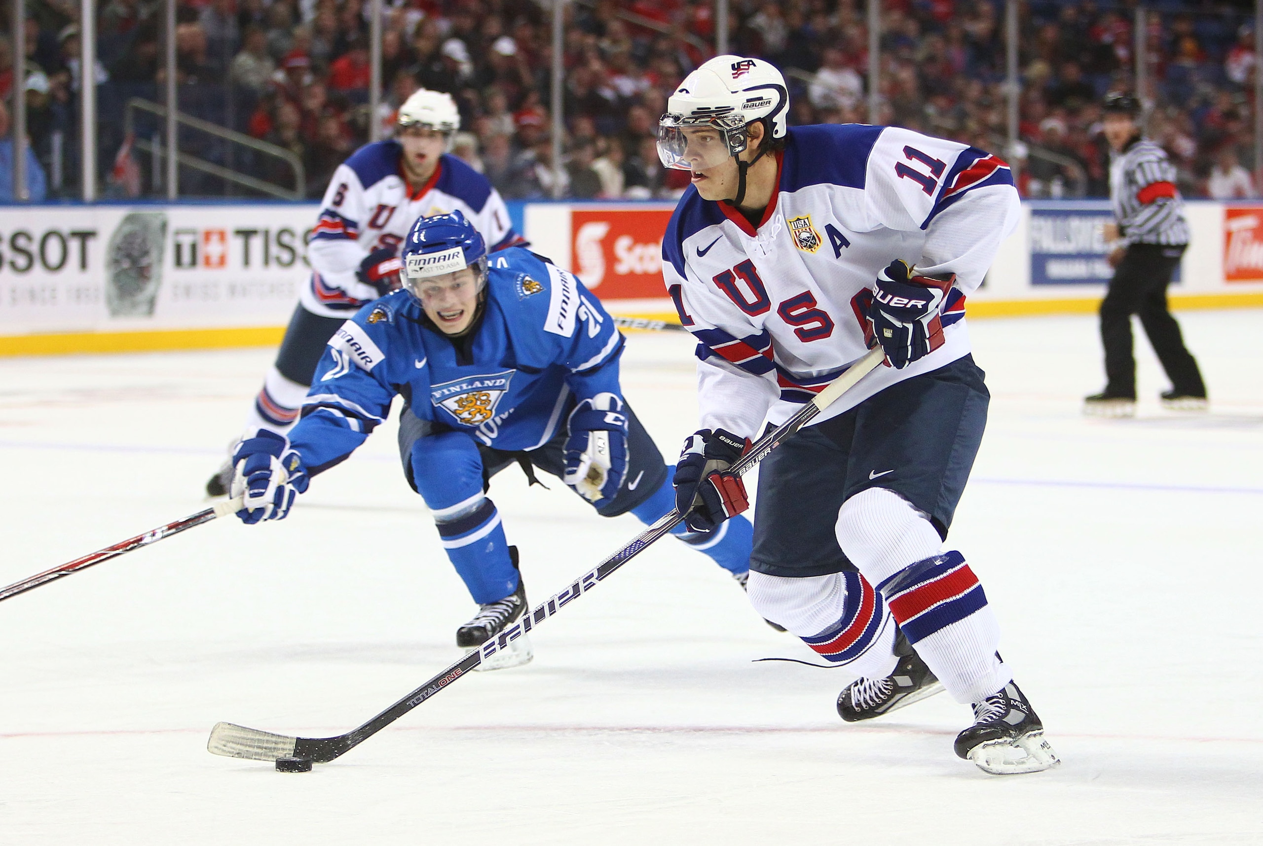 BUFFALO, NY - DECEMBER 26:  Jeremy Morin #11 of USA skates to the net with the puck during the 2011 IIHF World U20 Championship Group A game between USA and Finland on December 26, 2010 at HSBC Arena in Buffalo, New York. (Photo by Tom Szczerbowski/Getty