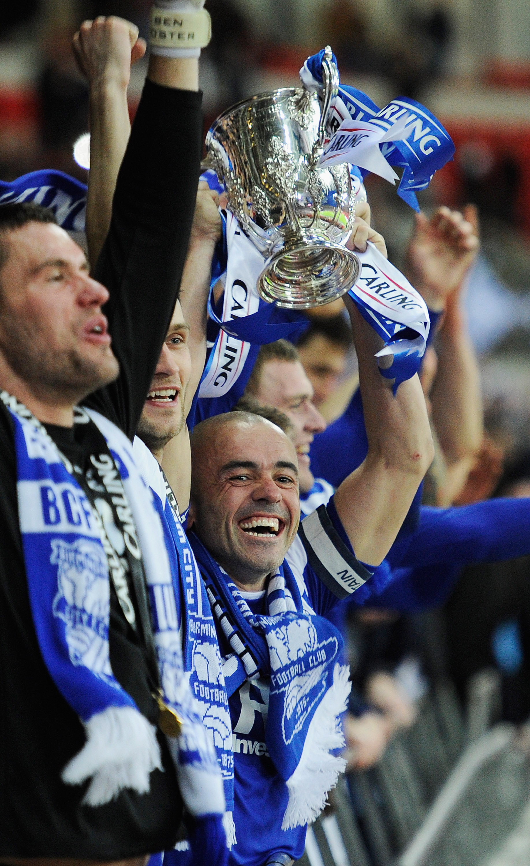 LONDON, ENGLAND - FEBRUARY 27: Stephen Carr of Birmingham City lifts the trophy after the Carling Cup Final between Arsenal and Birmingham City at Wembley Stadium on February 27, 2011 in London, England.  (Photo by Tom Jenkins-Pool/Getty Images)