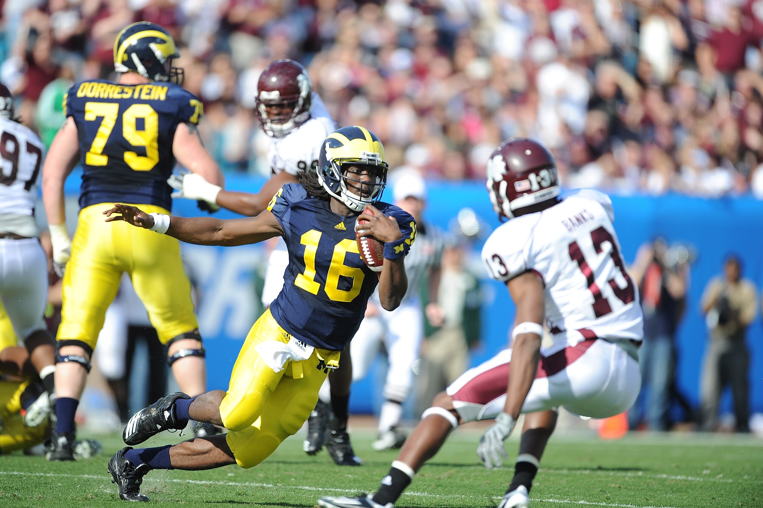 JACKSONVILLE, FL - JANUARY 01: Quarterback Denard Robinson #16 of the Michigan Wolverines rushes against the Mississippi State Bulldogs during the Gator Bowl at EverBank Field on January 1, 2011 in Jacksonville, Florida (Photo by Rick Dole/Getty Images) JACKSONVILLE, FL - JANUARY 01: Quarterback Denard Robinson #16 of the Michigan Wolverines rushes against the Mississippi State Bulldogs during the Gator Bowl at EverBank Field on January 1, 2011 in Jacksonville, Florida (Photo by Rick Dole/Getty Images)