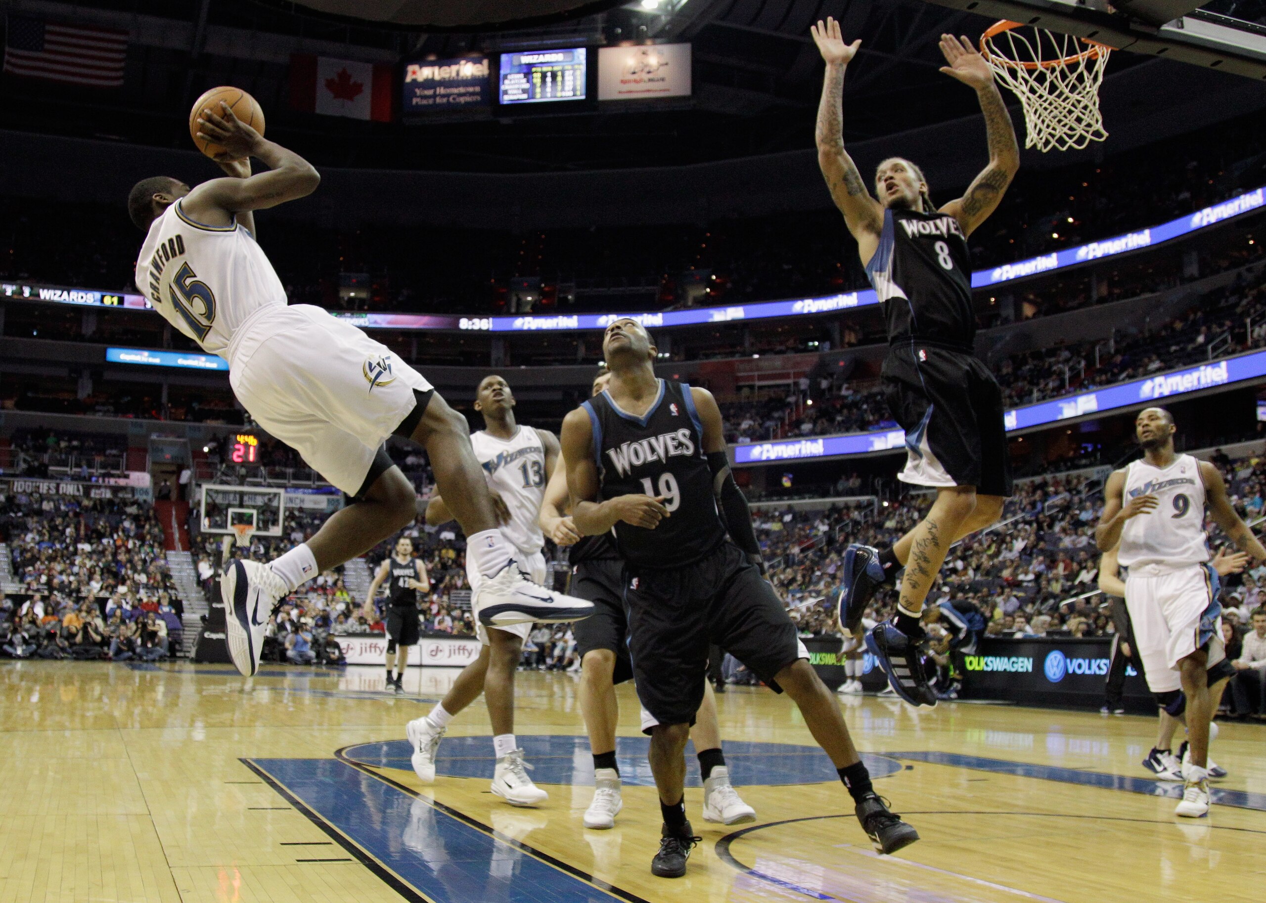 WASHINGTON, DC - MARCH 05: Jordan Crawford #15 of the Washington Wizards puts up a shot in front of Wayne Ellington #19 and Michael Beasley #8 of the Minnesota Timberwolves at the Verizon Center on March 5, 2011 in Washington, DC. NOTE TO USER: User expr WASHINGTON, DC - MARCH 05: Jordan Crawford #15 of the Washington Wizards puts up a shot in front of Wayne Ellington #19 and Michael Beasley #8 of the Minnesota Timberwolves at the Verizon Center on March 5, 2011 in Washington, DC. NOTE TO USER: User expr